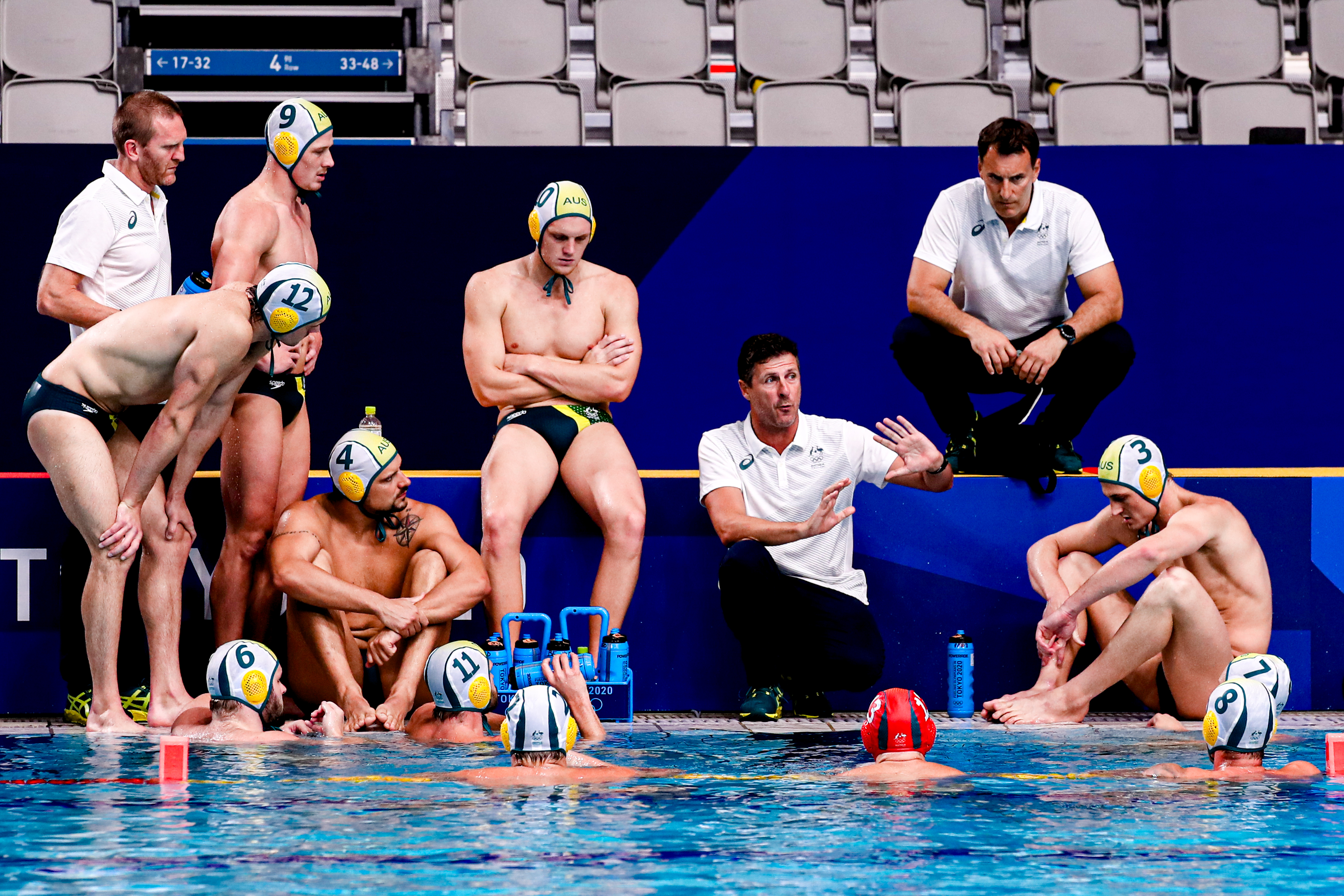 Australia's coach Elvis Fatovic addresses his players in Tokyo.