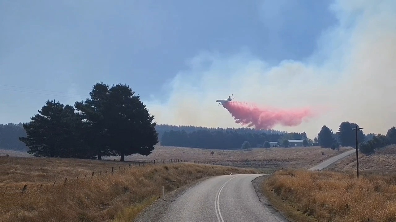 An emergency warning has been issued for residents in the New South Wales town of Curraweela as a grass fire burns out of control.