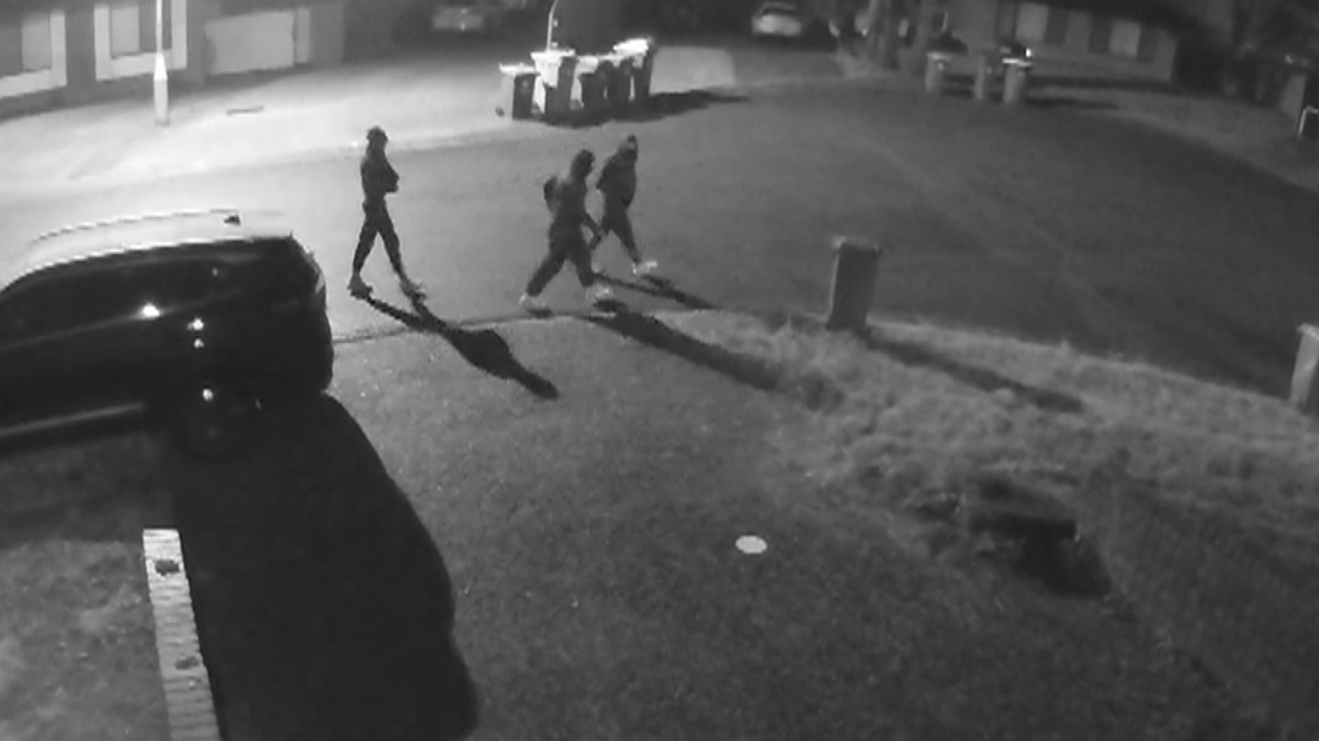 Three men were scoping out the street moments before the shooting and firebombing.