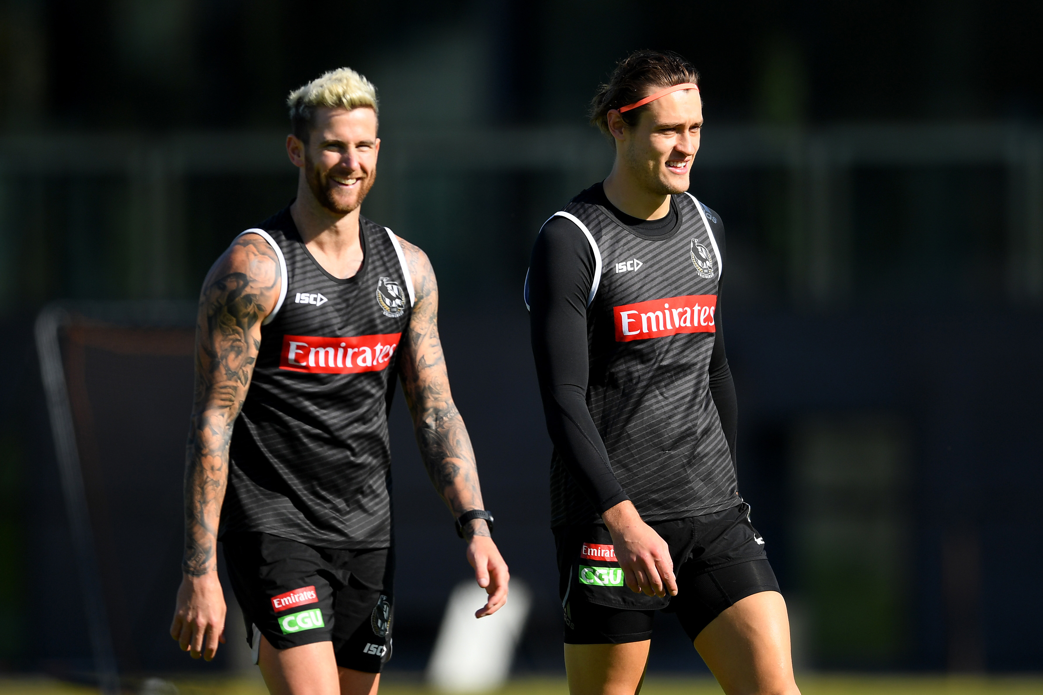 Jeremy Howe and Darcy Moore during a Collingwood Magpies training session.