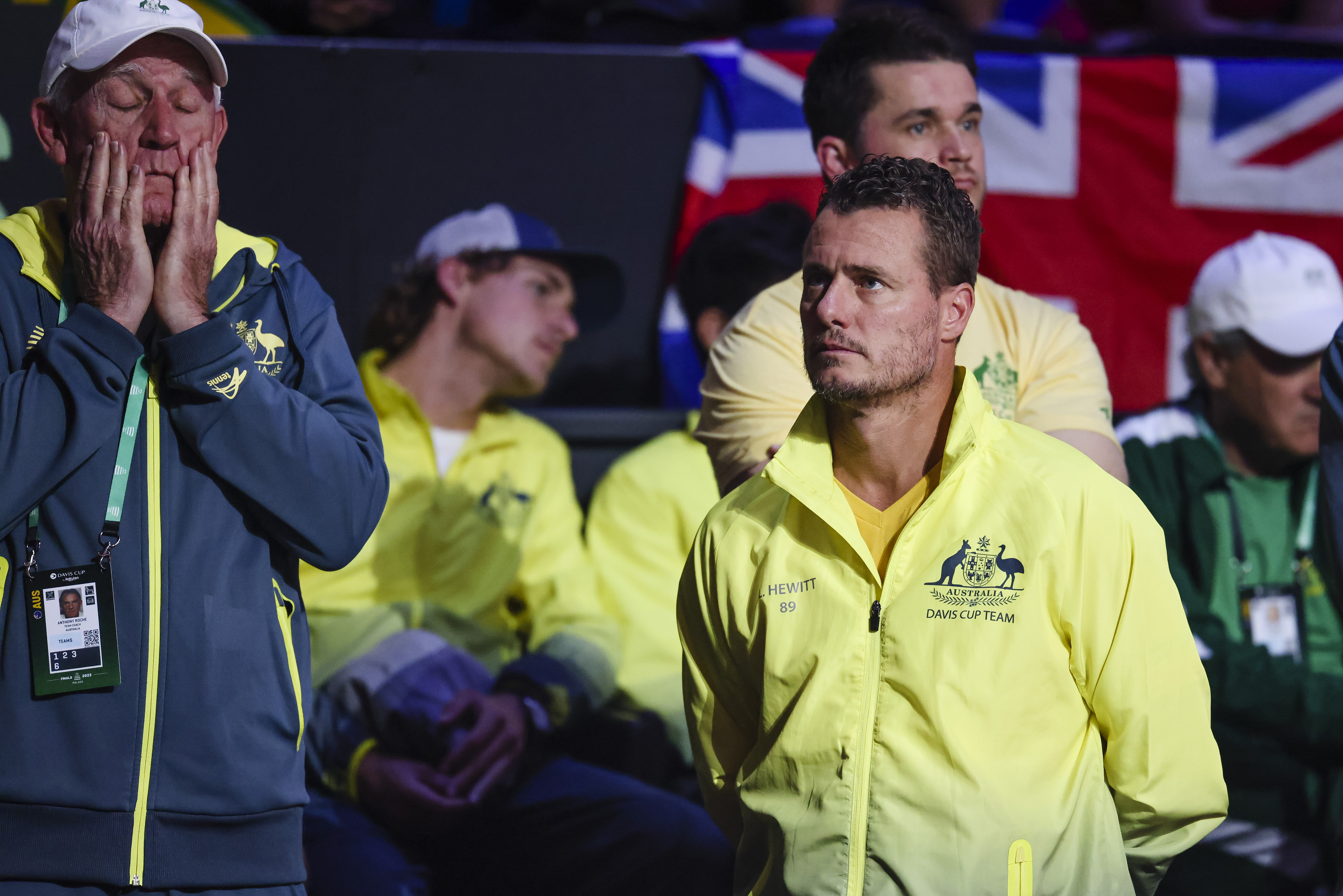 Australian team coach Anthony Roche (left) and team captain Lleyton Hewitt react after losing.