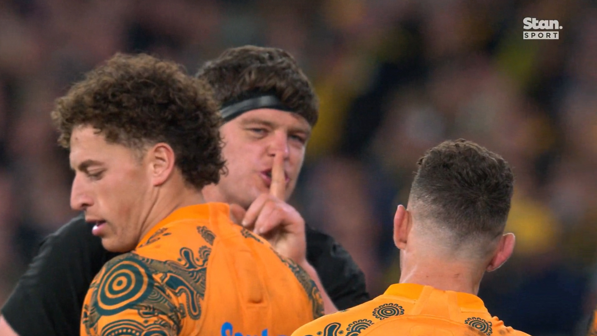 All Blacks lock Scott Barrett tells Wallabies scrum-half Nic White to keep quiet.