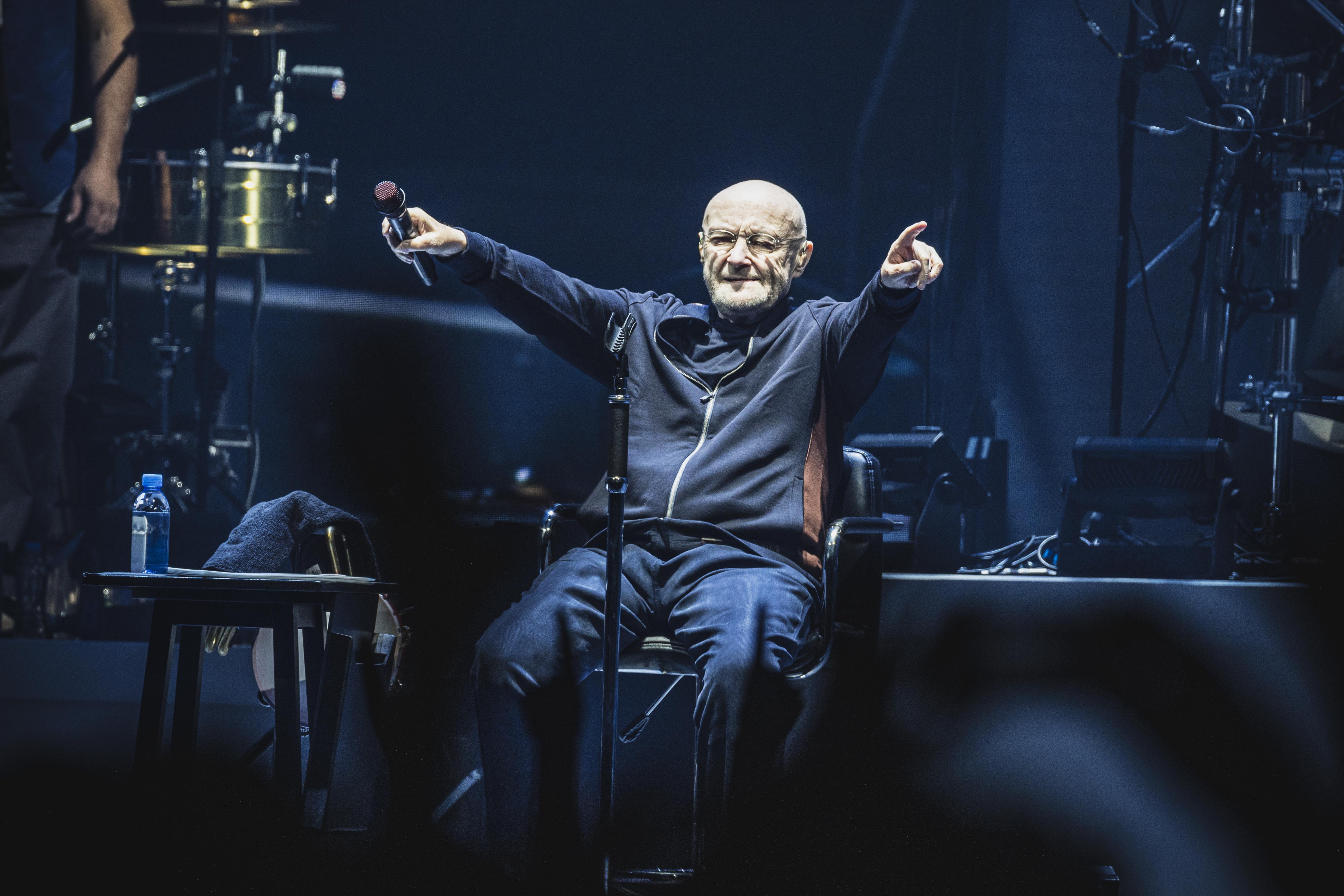 British singer and drummer Phil Collins of the band Genesis performs live on stage during a concert at Mercedes Benz Arena on March 7, 2022 in Berlin, Germany.