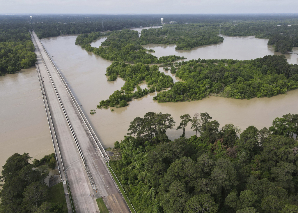 The bridge over Lake Houston along West Lake Houston Parkway from Kingwood to Atascocita is seen after it was closed due to high water on either side of the thoroughfare, Saturday, May 4, 2024, in Kingwood, Texas. (Jason Fochtman/Houston Chronicle via AP)