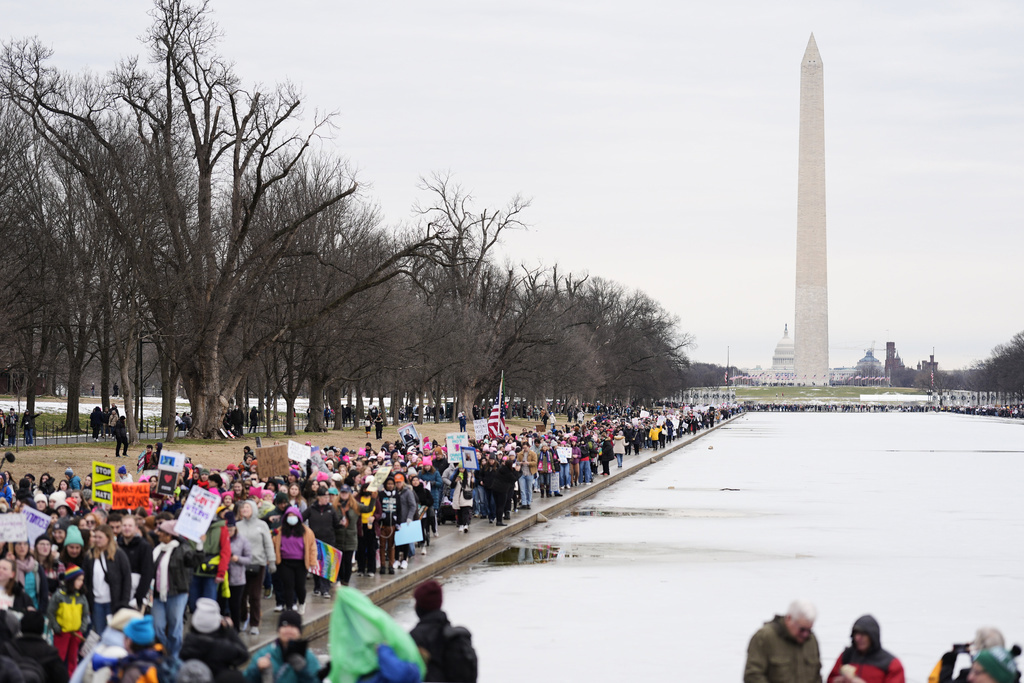 Thousands march in Washington days before Trump takes office