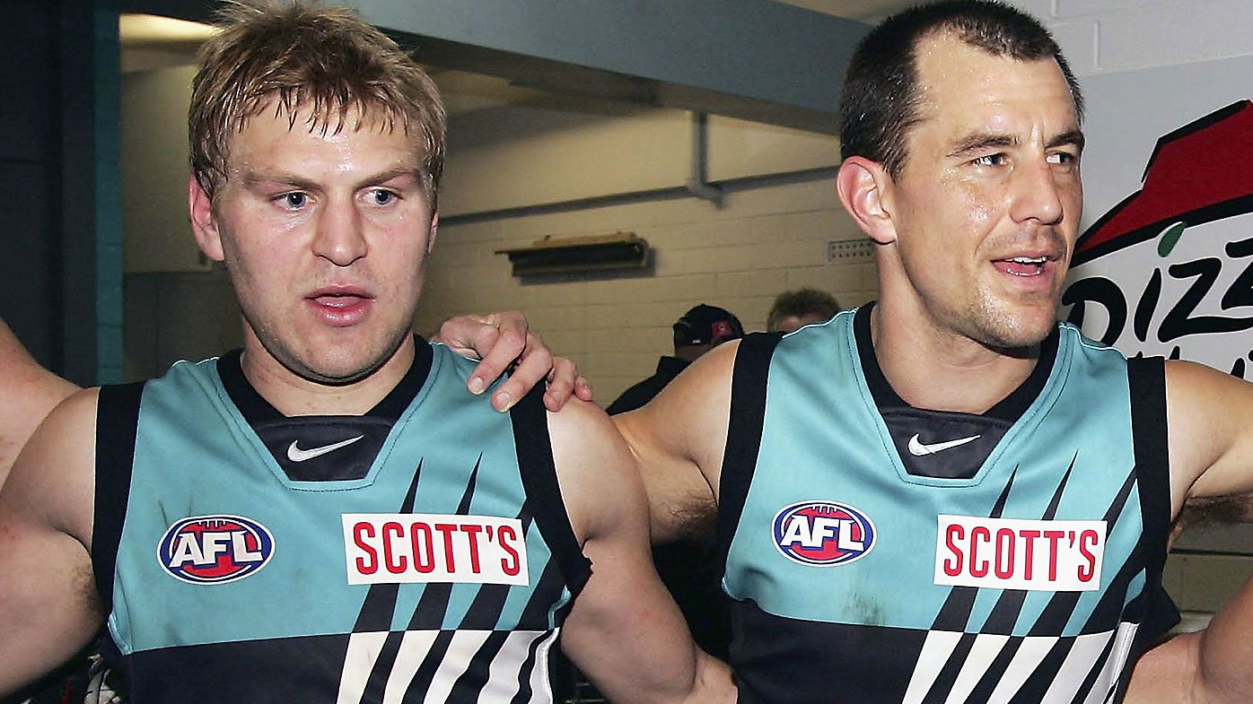 Kane Cornes and Warren Tredrea