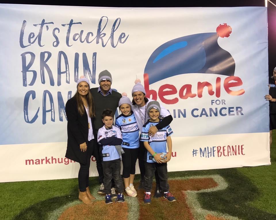 Maddy Callander (left) and family at the first Beanie for Brain Cancer game.