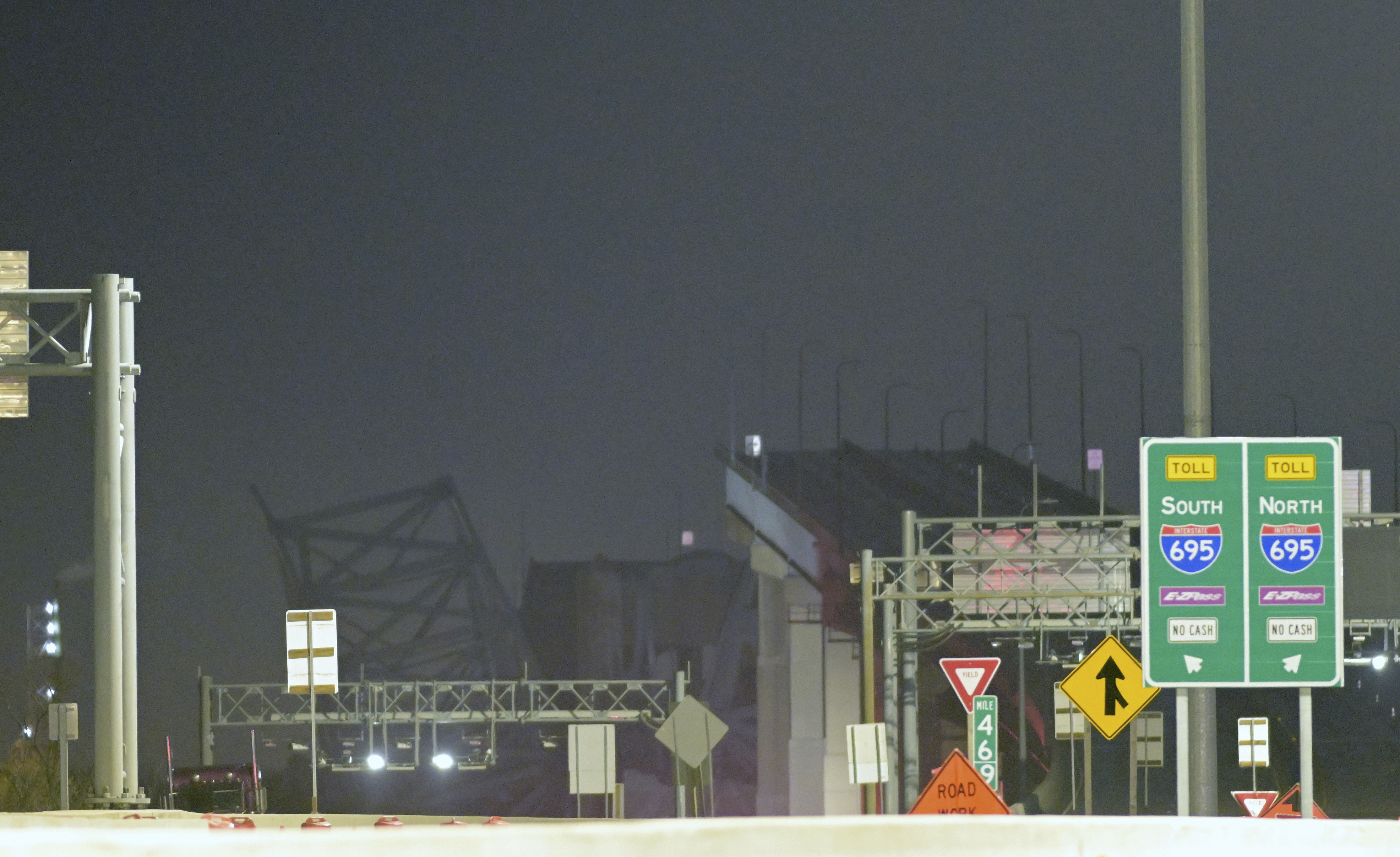 Parts of the Francis Scott Key Bridge remain after a container ship collided with a support Tuesday, March 26, 2024, in Baltimore. 