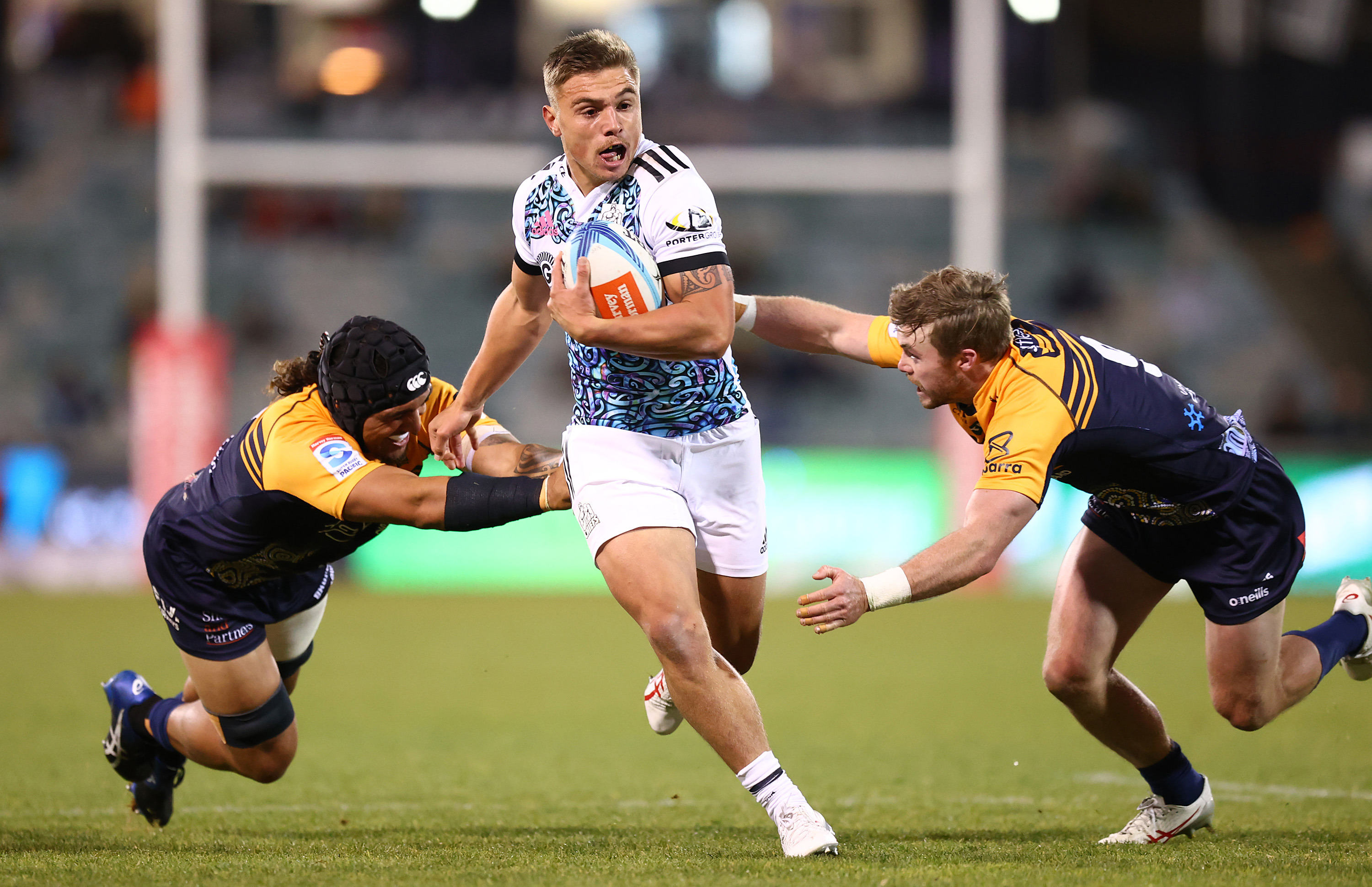 Cortez Ratima of the Chiefs makes a break during the round 14 Super Rugby Pacific match between ACT Brumbies and Chiefs.