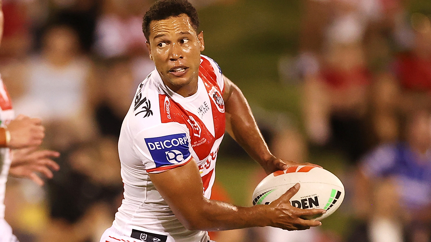 Moses Mbye makes a break for the Dragons against St Helens.