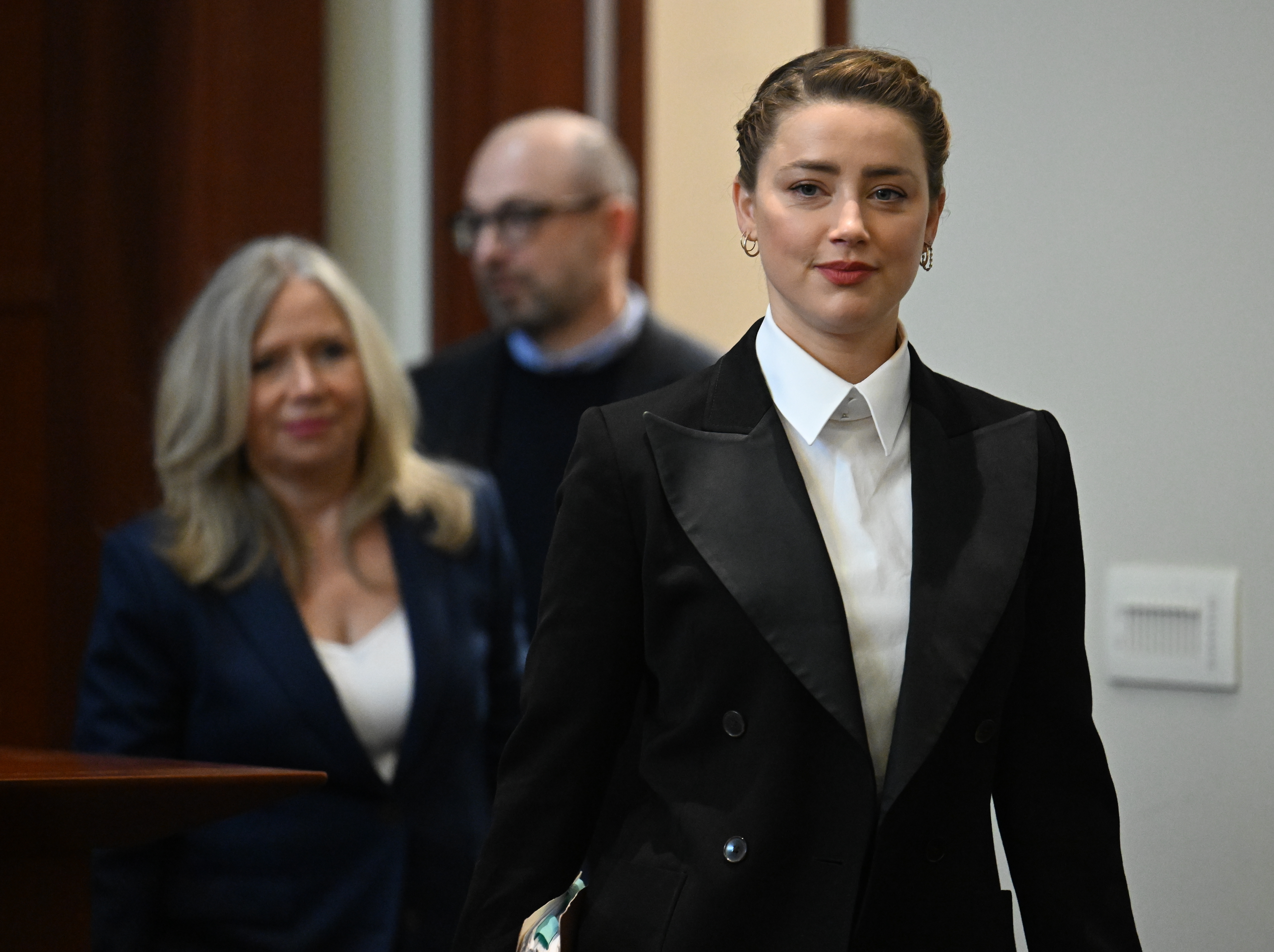 Actor Amber Heard arrives in the courtroom at the Fairfax County Circuit Court in Fairfax, Va., Tuesday May 3, 2022. 