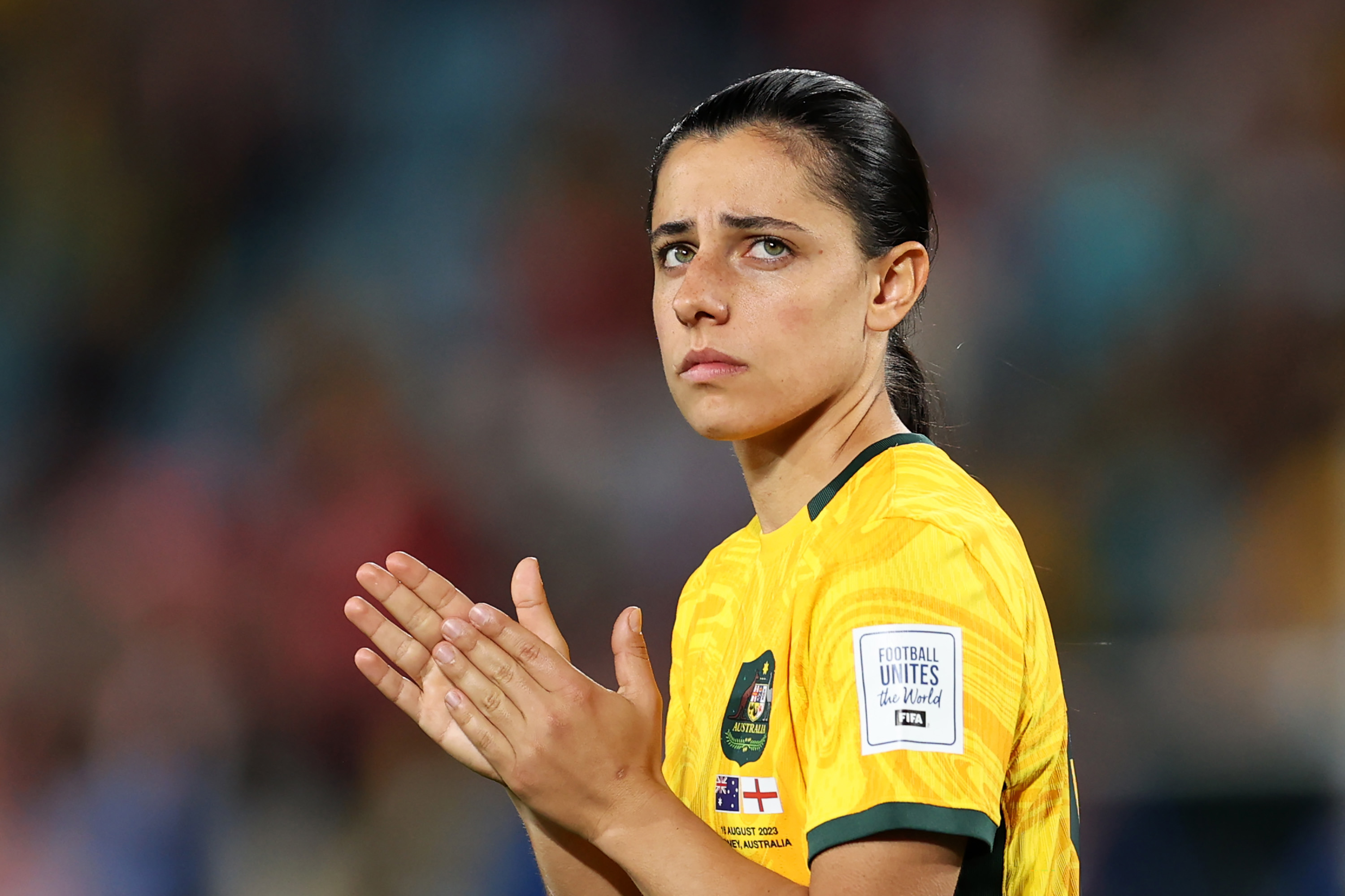 Alex Chidiac of Australia applauds fans after the team's 1-3 defeat following the FIFA Women's World Cup Australia & New Zealand 2023 Semi Final match between Australia and England at Stadium Australia on August 16, 2023 in Sydney, Australia. (Photo by Brendon Thorne/Getty Images)