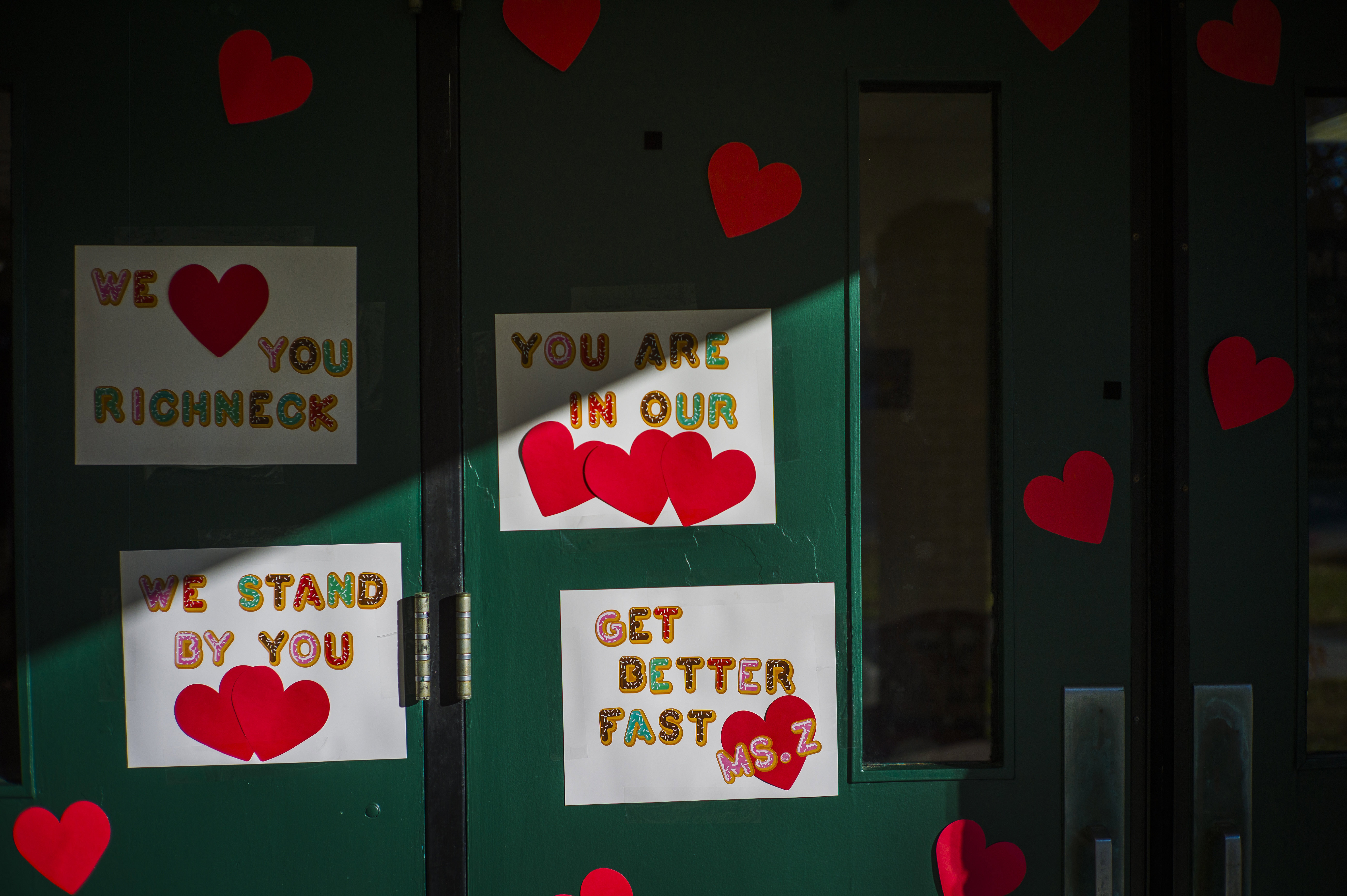 Messages of support for teacher Abby Zwerner, who was shot by a 6 year old student, grace the front door of Richneck Elementary School Newport News, Va. on Monday Jan. 9, 2023. 
