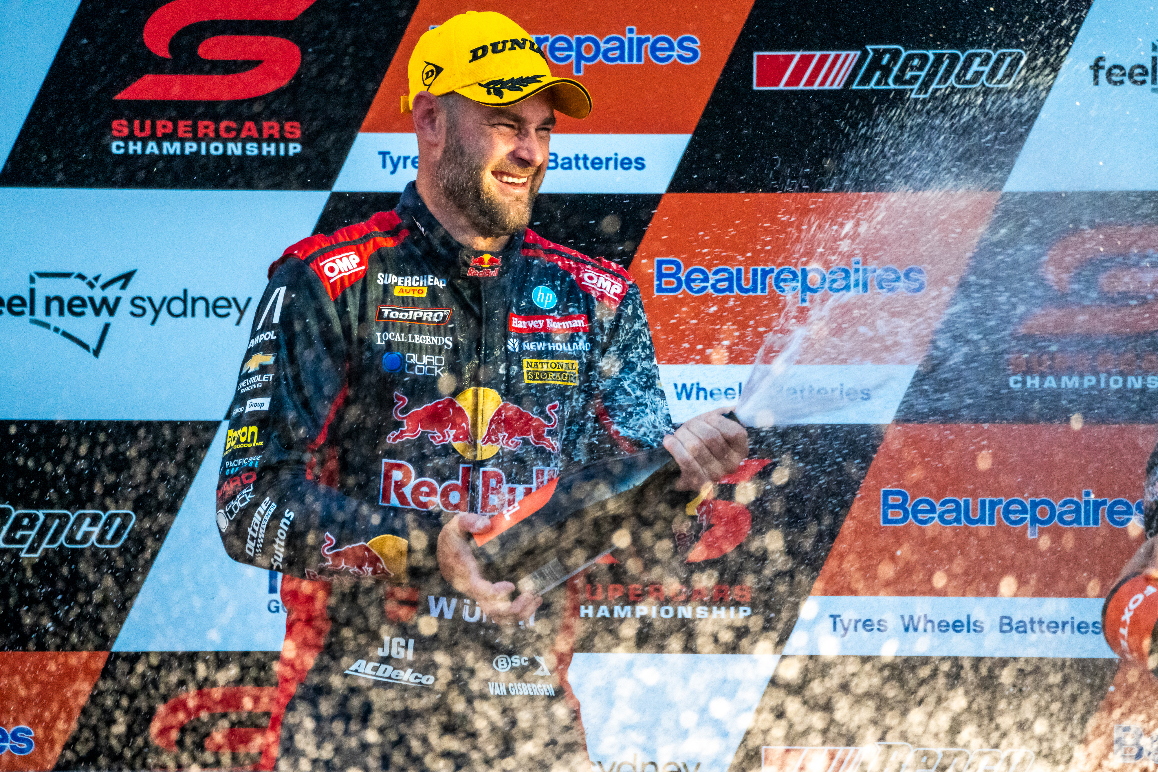 Shane van Gisbergen celebrates victory in the Supercars Championship.