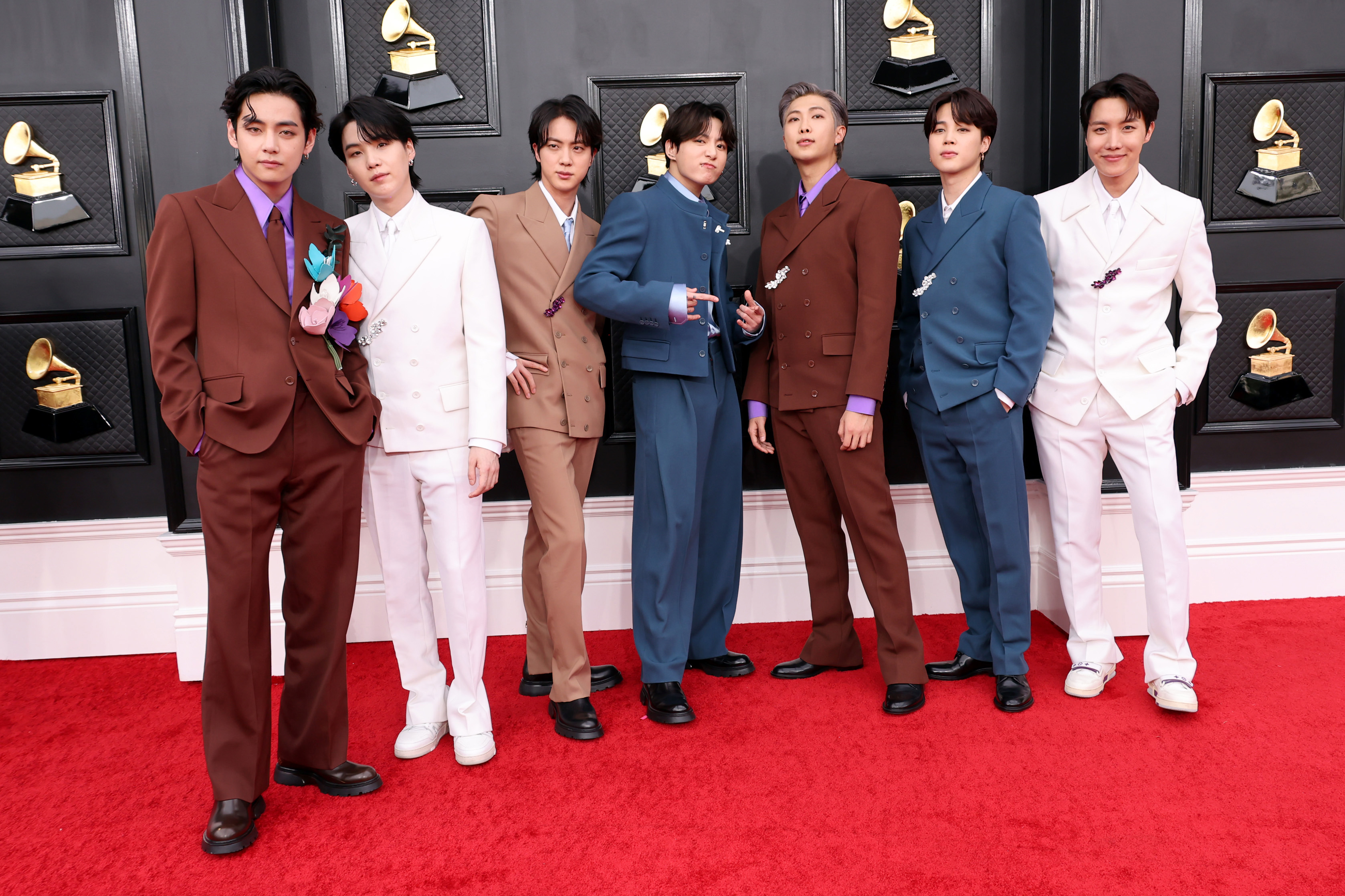 V, Suga, Jin, Jungkook, RM, Jimin and J-Hope of BTS attend the 64th Annual GRAMMY Awards at MGM Grand Garden Arena on April 03, 2022 in Las Vegas, Nevada.