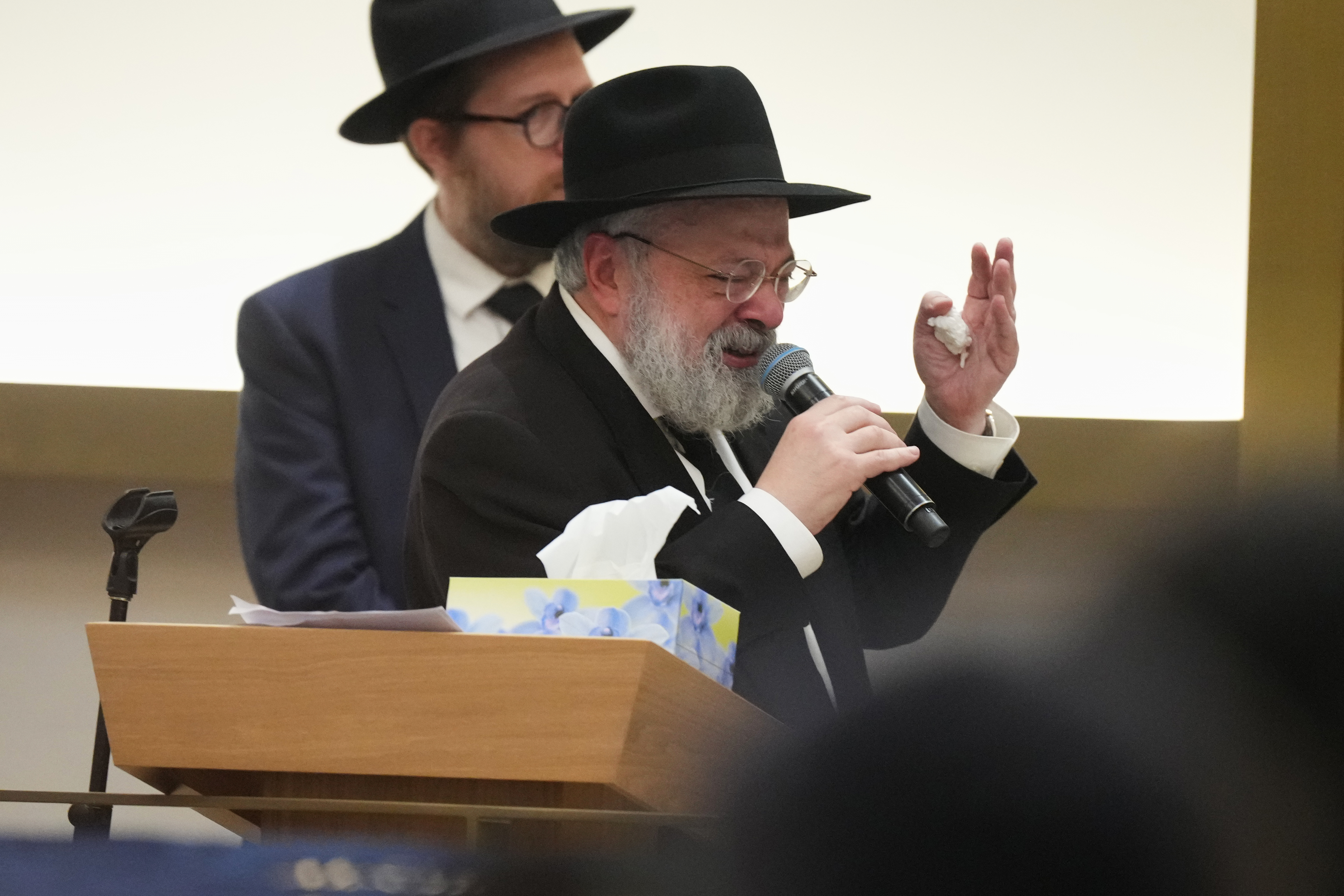 Rabbi Yehoram Ulman, father-in-law of Rabbi Eli Schlanger, speaks at his funeral.