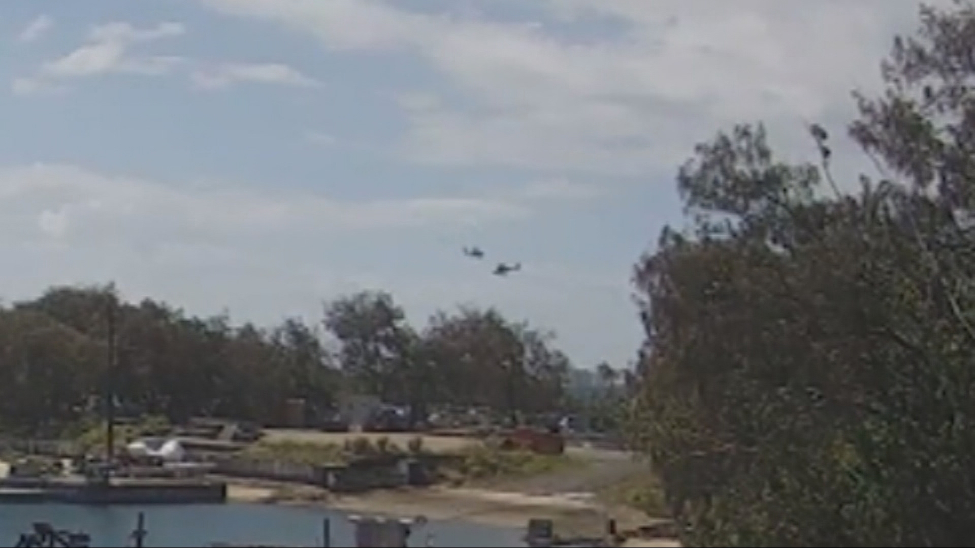 An inquest into the Sea World helicopter crash has been shown several videos of the moment the aircraft collided.