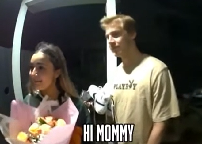young girl introduces boyfriend to mother
