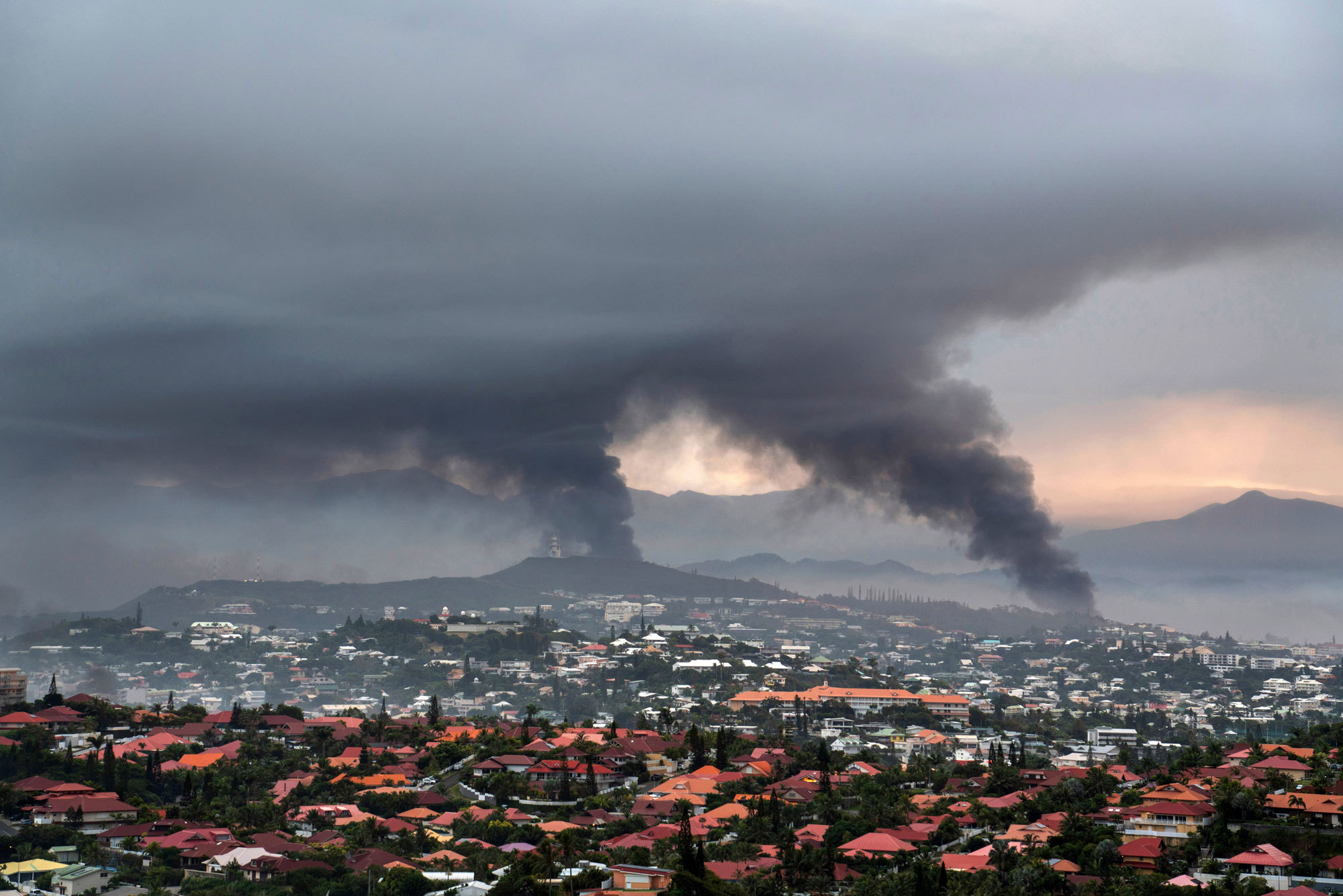 Smoke rises during protests in Noumea, New Caledonia on Wednesday last week.