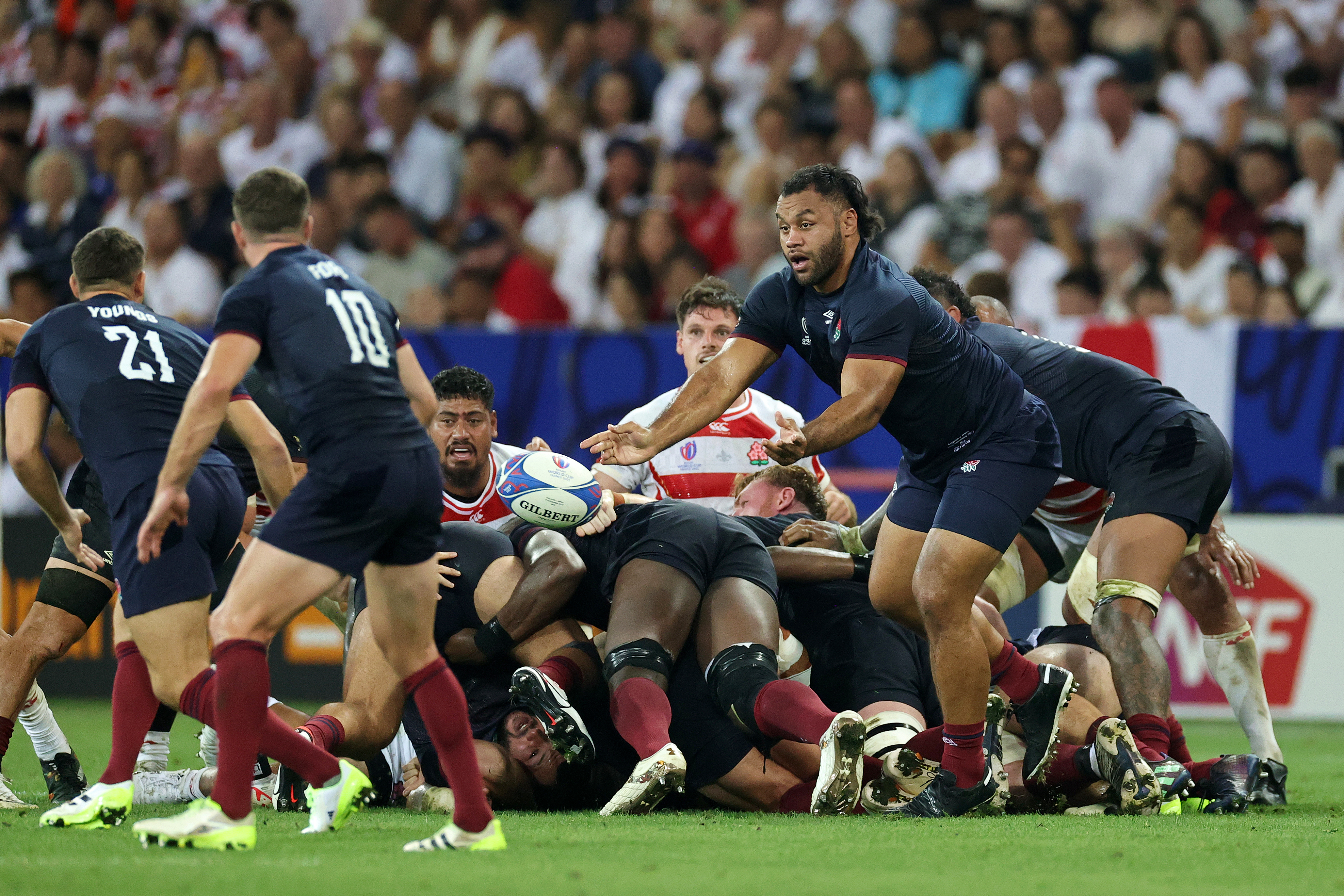 Billy Vunipola passes the ball during the Rugby World Cup match between England and Japan.