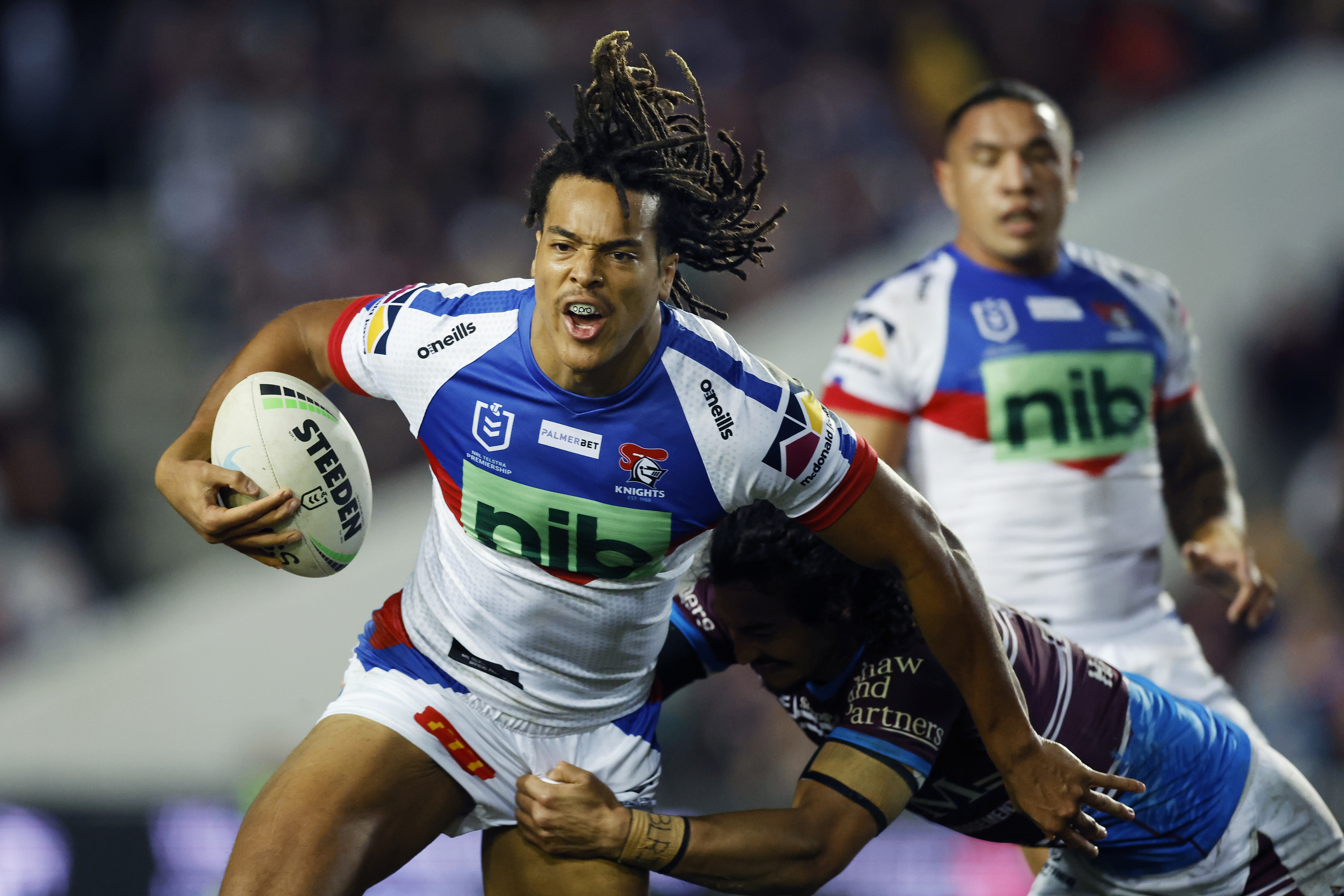 SYDNEY, AUSTRALIA - JULY 16: Dominic Young of the Knights is tackled during the round 18 NRL match between the Manly Sea Eagles and the Newcastle Knights at 4 Pines Park, on July 16, 2022, in Sydney, Australia. (Photo by Mark Evans/Getty Images)