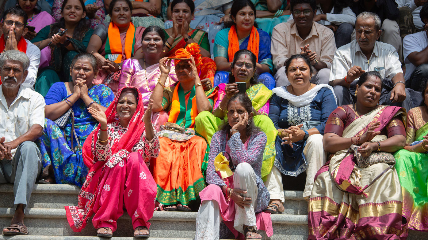 India election 2024 - Supporters of the Bharatiya Janata Party (BJP) watch a giant screen telecasting election results live on June 04, 2024 in Bengaluru, India