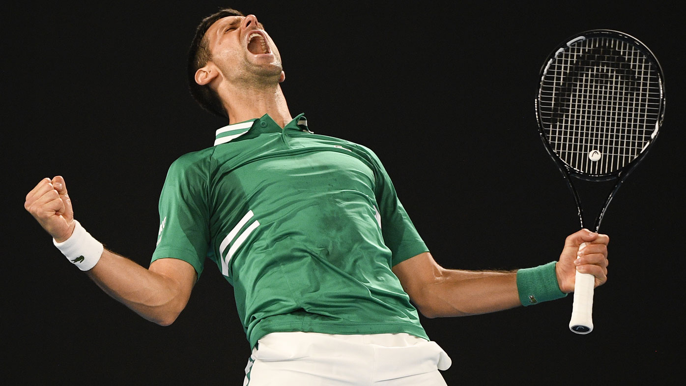 Serbia's Novak Djokovic celebrates after defeating United States' Talyor Fritz in their third round match at the Australian Open tennis championship in Melbourne, Australia, Saturday, Feb. 13, 2021