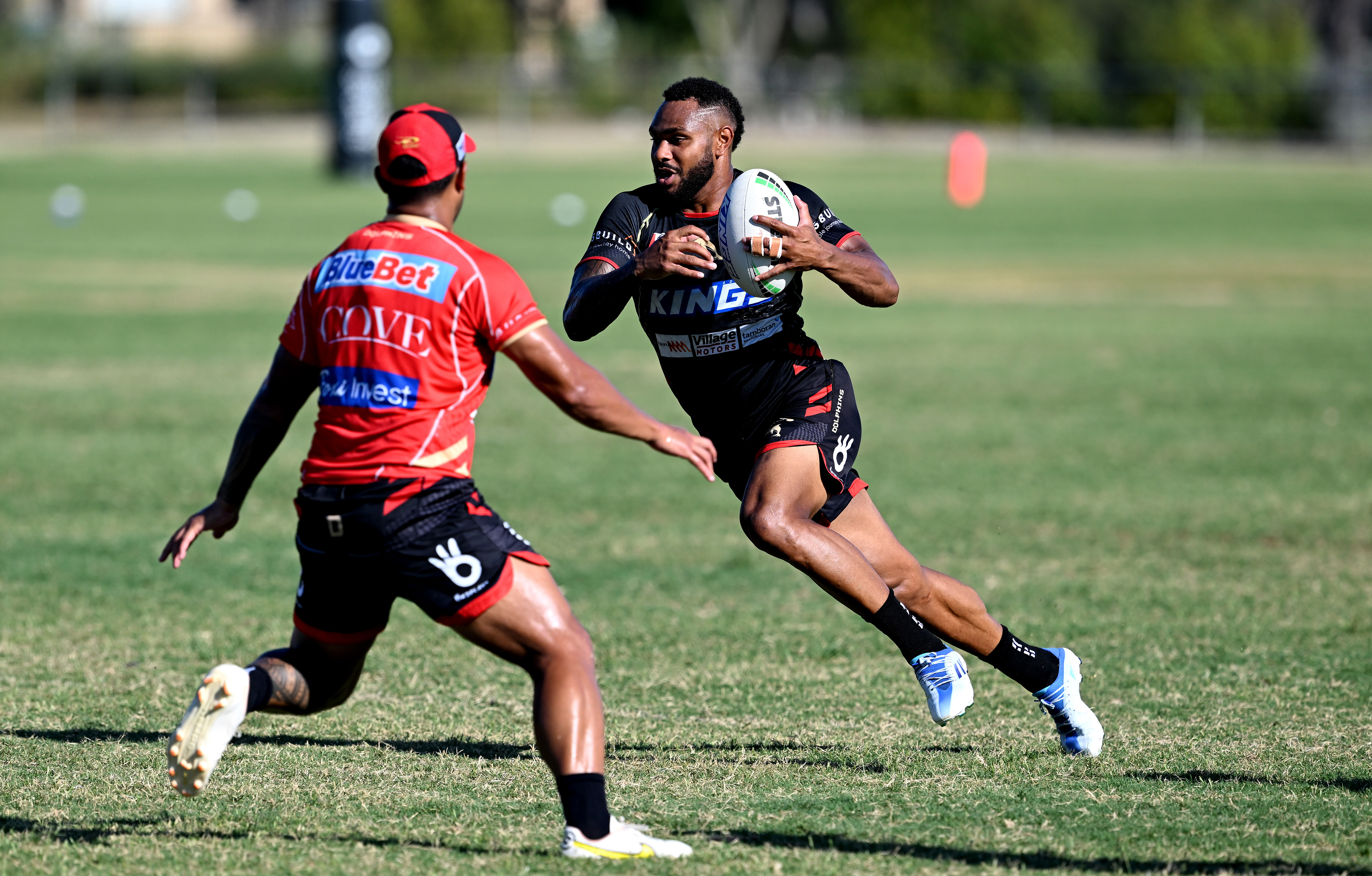 Hamiso Tabuai-Fidow runs with the ball during a Dolphins NRL training session at Kayo Stadium on February 03, 2023 in Brisbane, Australia. (Photo by Bradley Kanaris/Getty Images)
