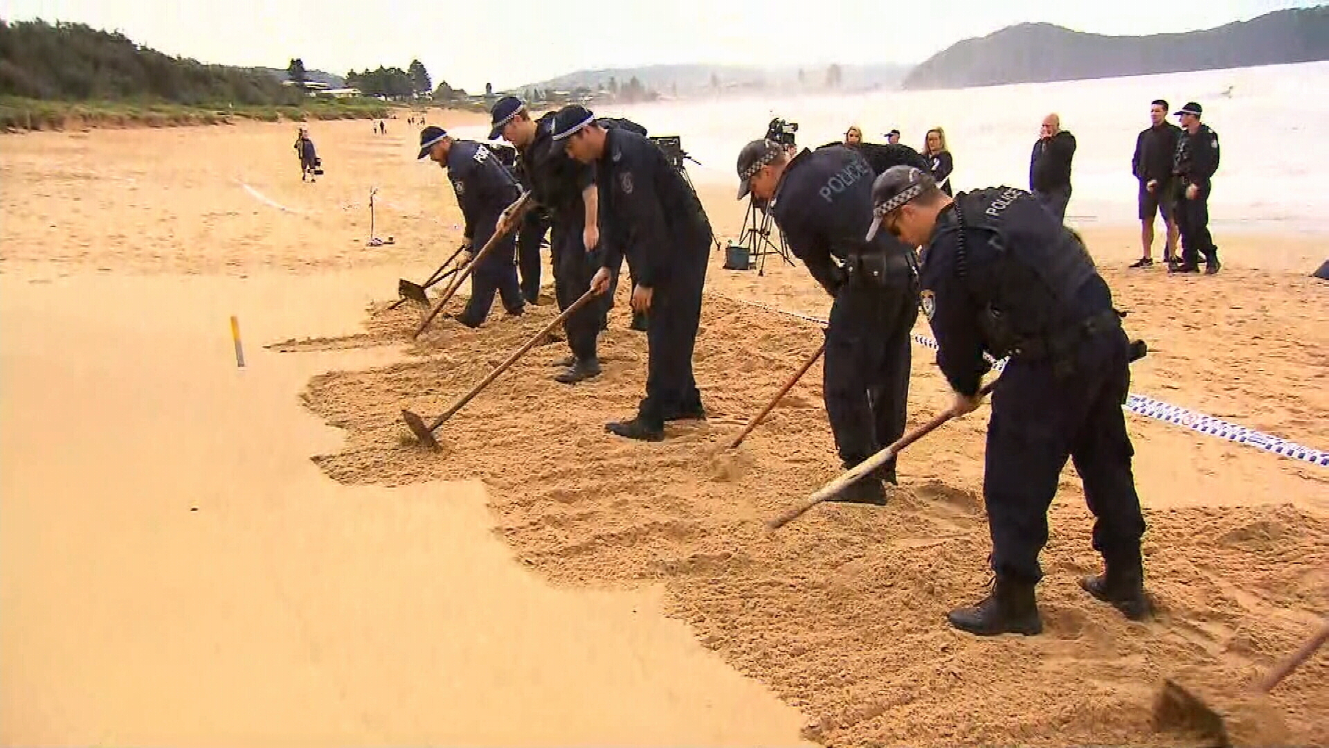 NSW Police are scouring the sand at Umina Beach for evidence.