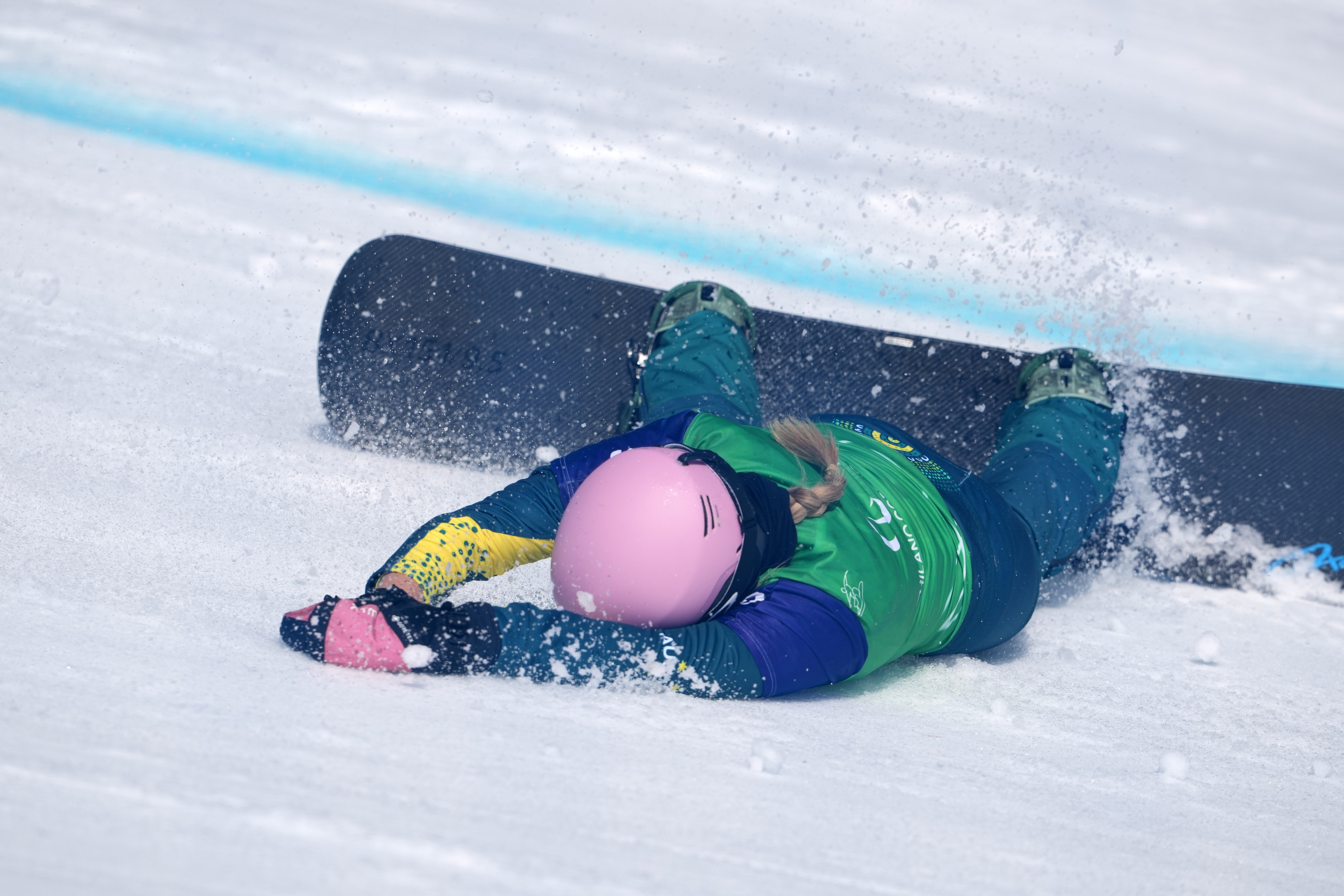 Amanda Reid of Australia crashes during a women's snowboard cross SB-LL2 pre-heat.