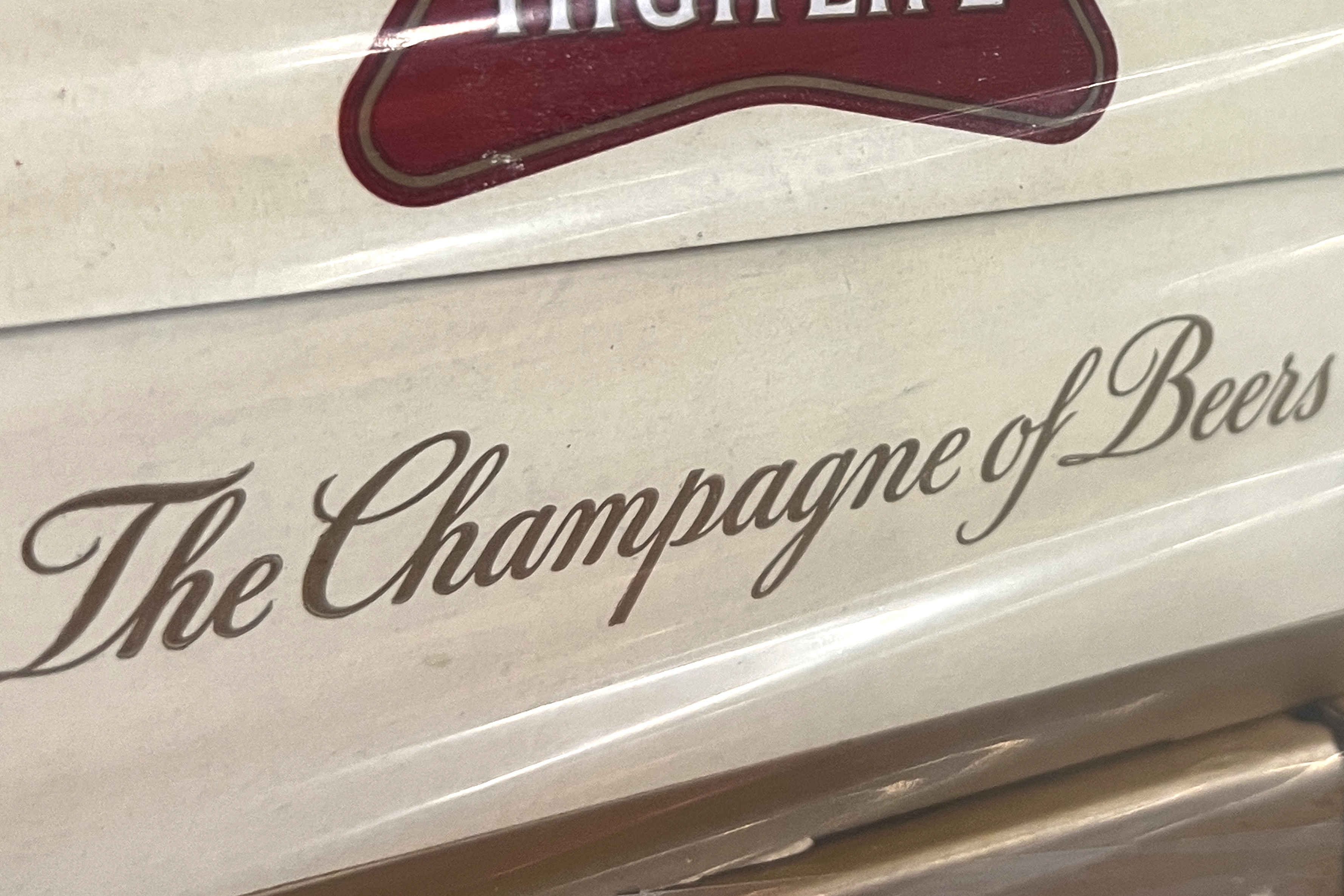 A label on the side of a carton of Miller High Life beer at the Westlandia plant in Ypres, Belgium, Monday, April 17, 2023. 