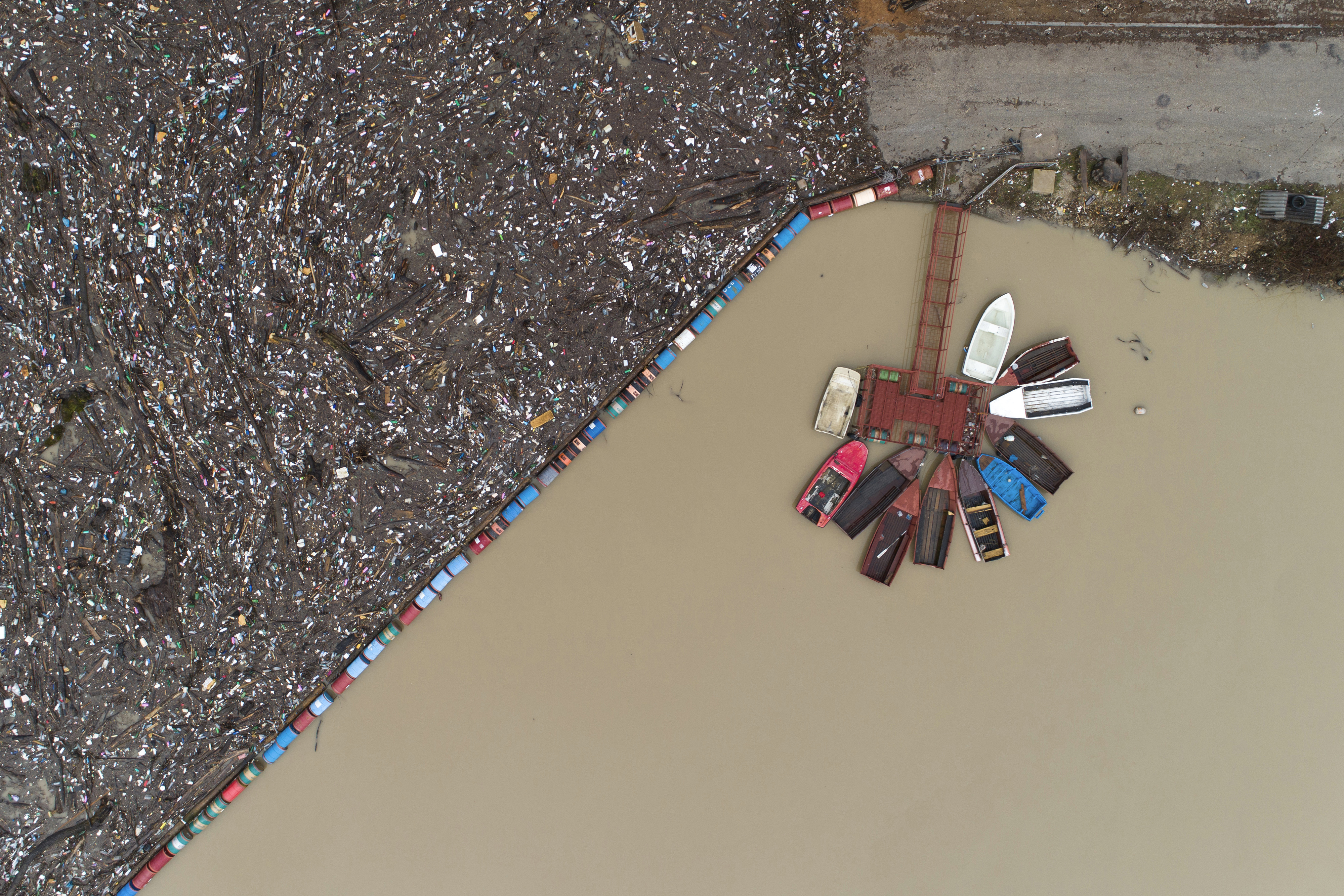 Tons of waste dumped in poorly regulated riverside landfills or directly into the rivers across three Western Balkan countries end up accumulating during high water season in winter and spring.