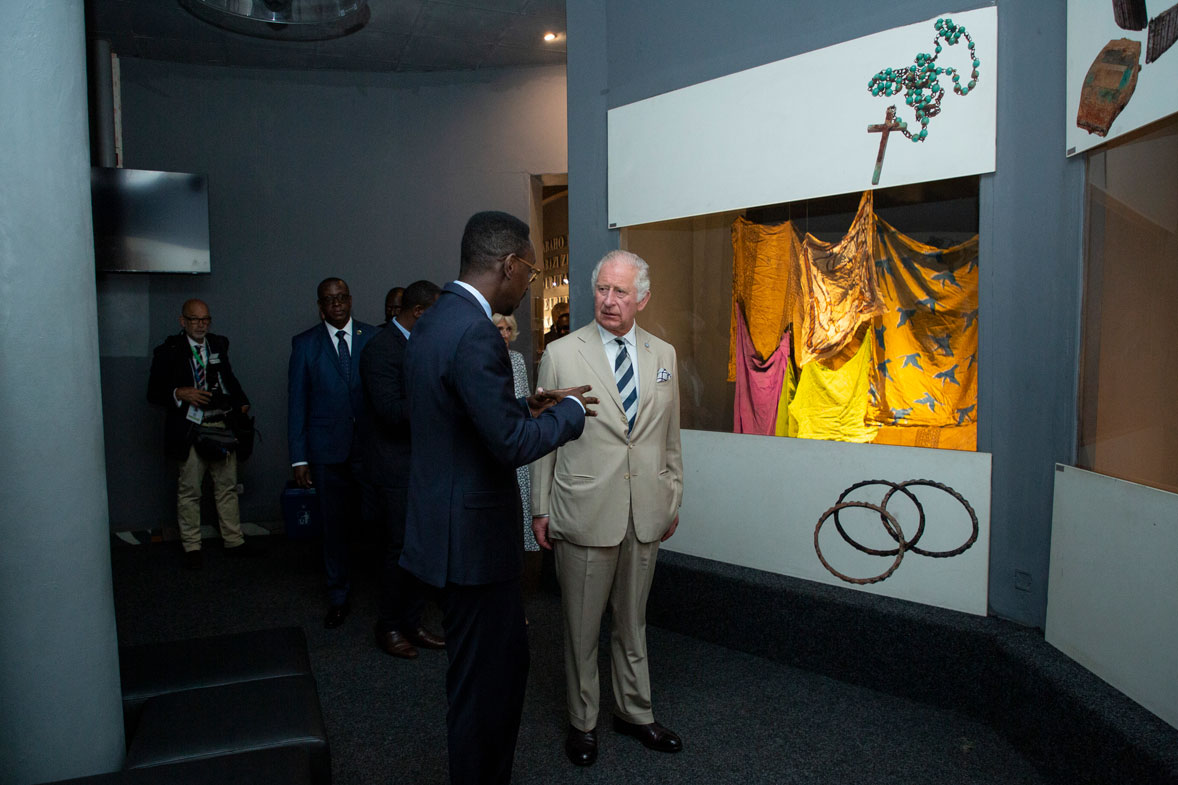 Prince Charles visits an exhibition of the personal effects of some of those who died, at the Kigali Genocide Memorial in the capital Kigali, Rwanda Wednesday, June 22, 2022. 