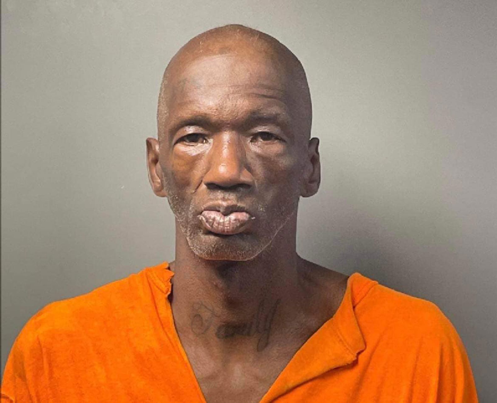 An Alabama man was arrested after failing to report that he'd been living "for days" with a dead relative in his home.