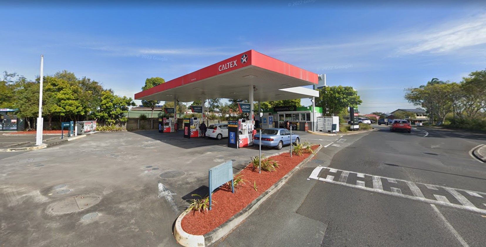 A service station worker was held at knifepoint in QLD