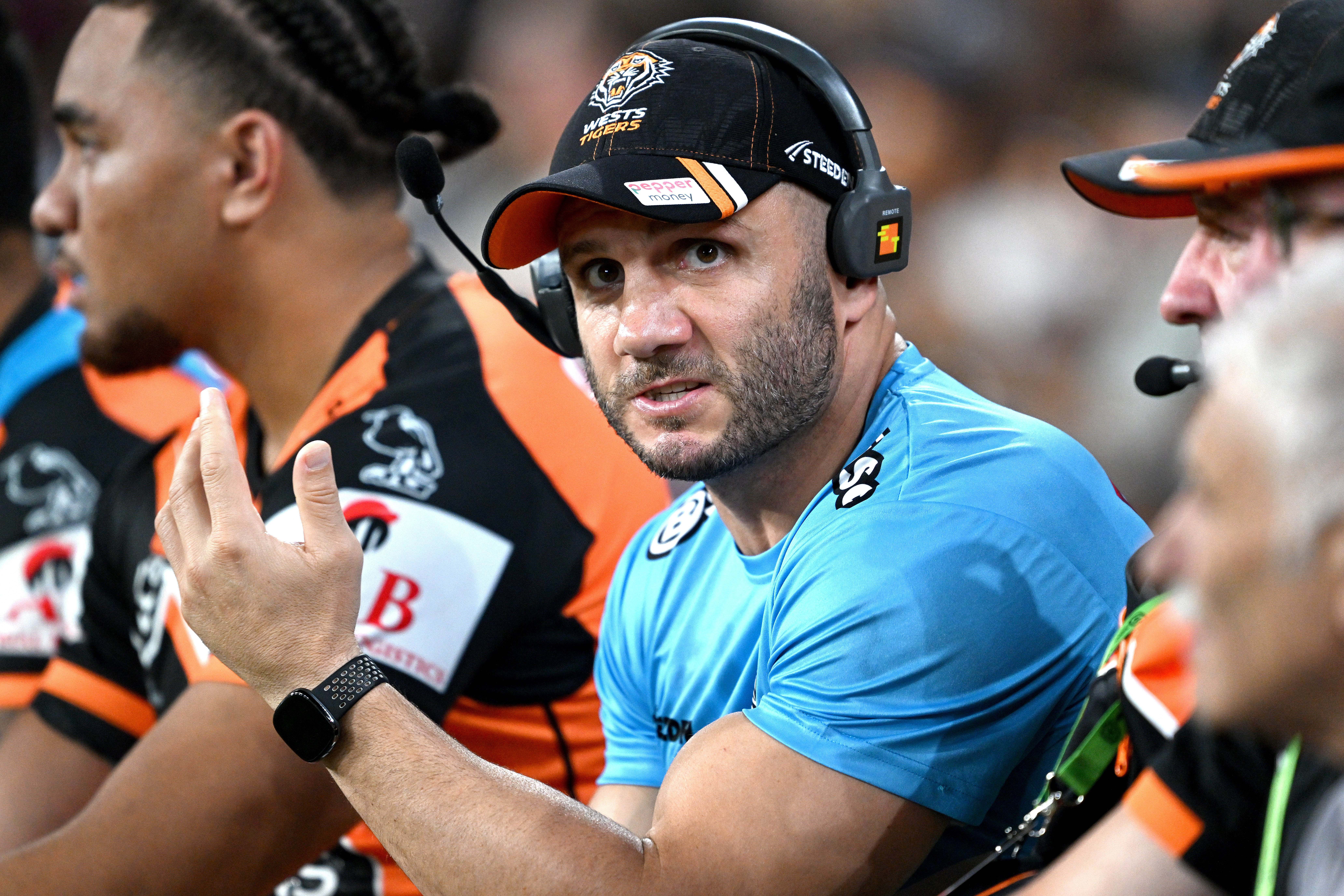 Assistant coach Robbie Farah of the Tigers looks frustrated.