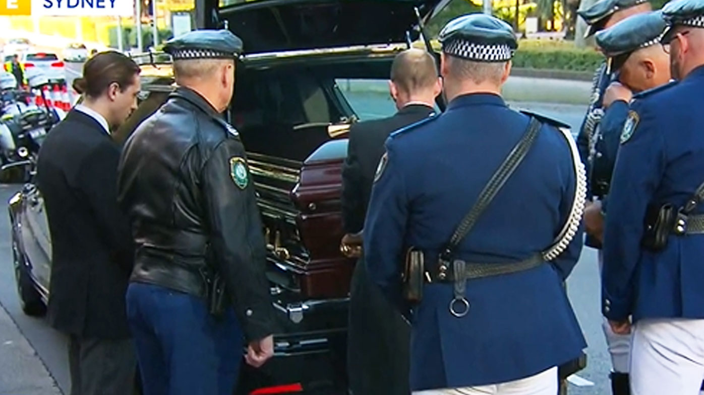 Bob Fulton's casket arrives ahead of his State Funeral at Sydney's St. Mary's Cathedral.