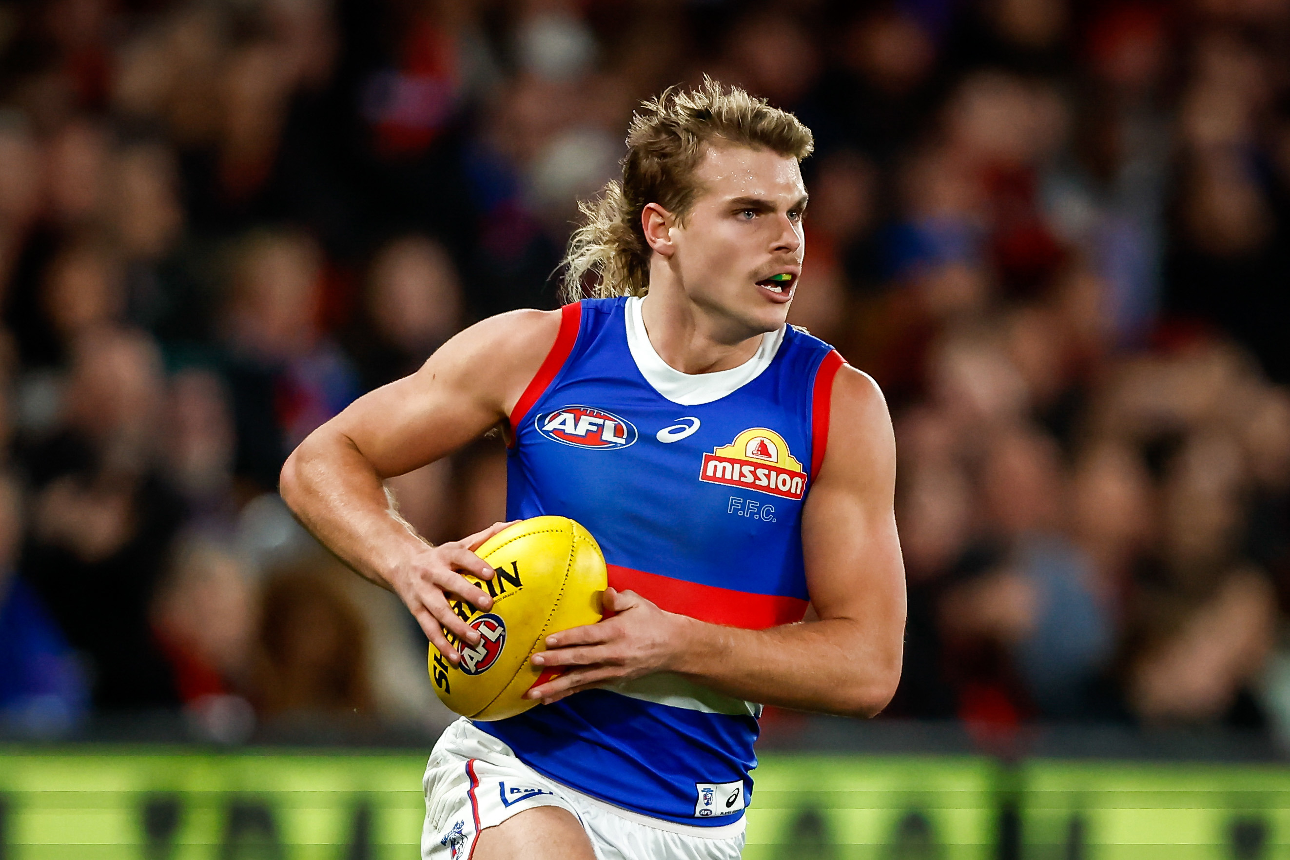 MELBOURNE, AUSTRALIA - JULY 21: Bailey Smith of the Bulldogs in action during the 2023 AFL Round 19 match between the Essendon Bombers and the Western Bulldogs at Marvel Stadium on July 21, 2023 in Melbourne, Australia. (Photo by Dylan Burns/AFL Photos via Getty Images)