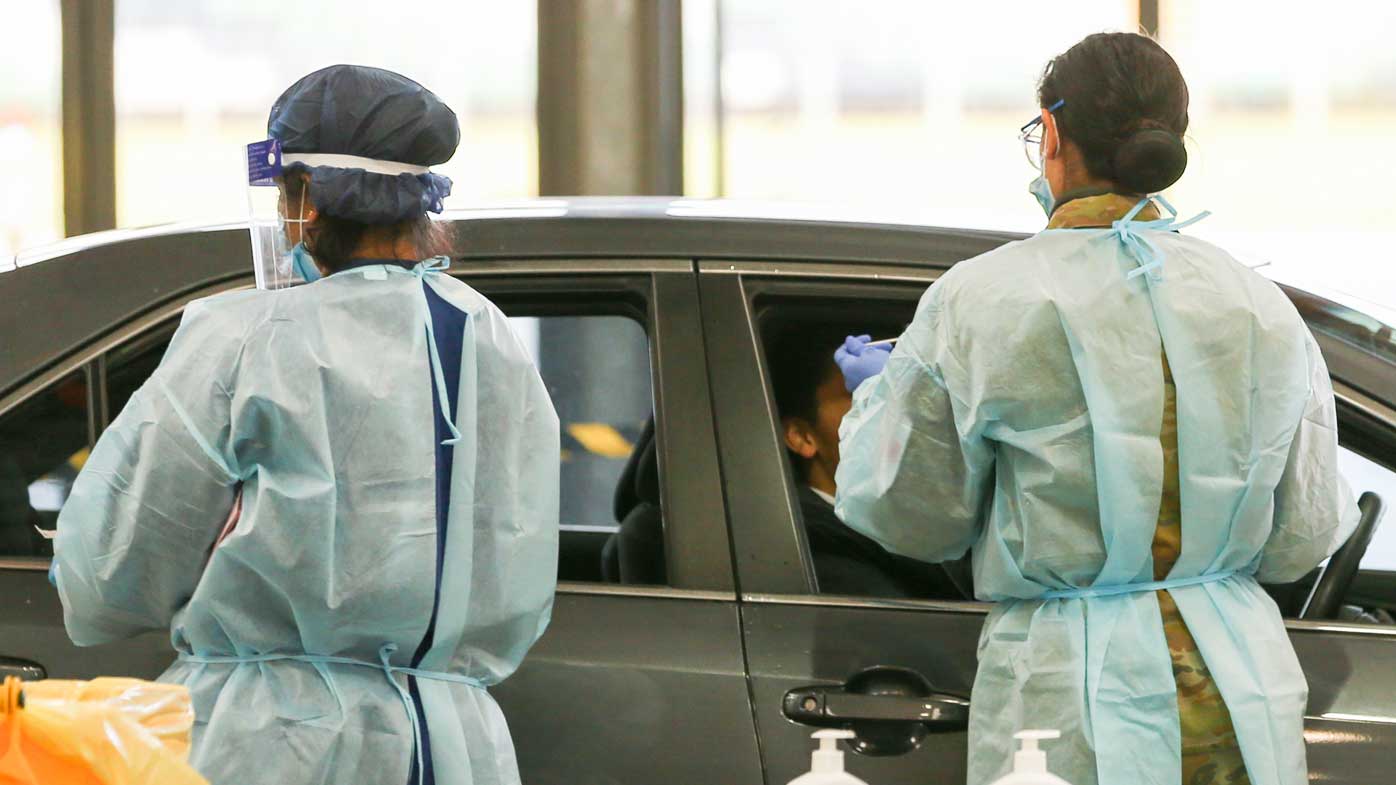 People get tested for Covid-19 at a drive through testing site at Flemington.