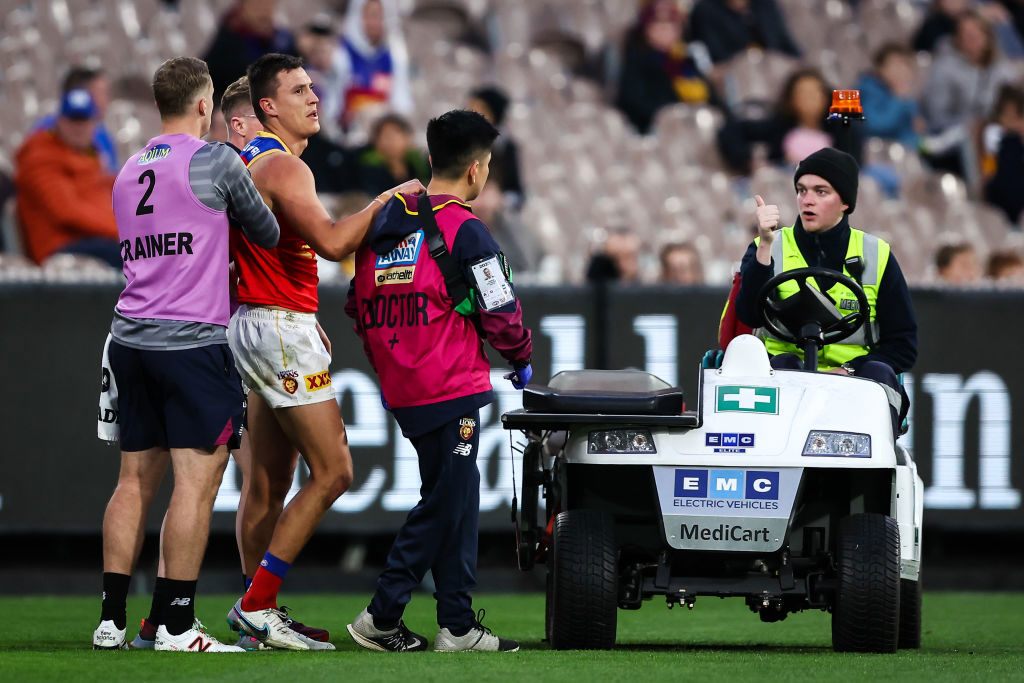 Hugh McCluggage is seen injured against Hawthorn.