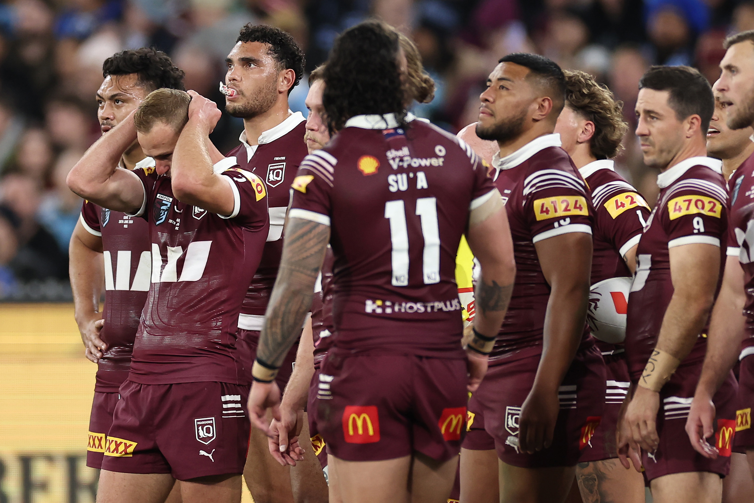 Daly Cherry-Evans of the Maroons reacts after a Blues try.