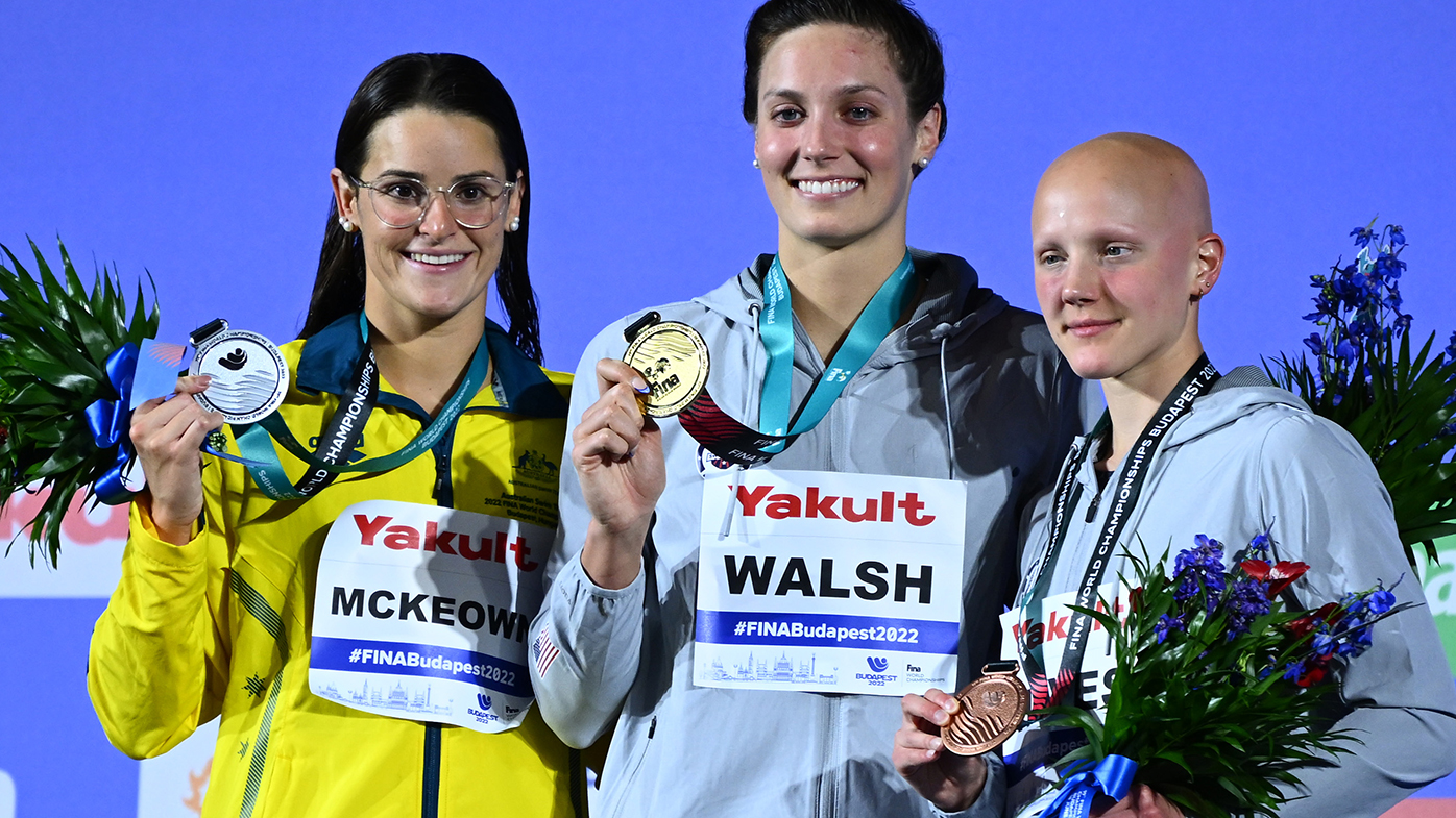 Silver medallist Kaylee McKeown, gold medallist Alex Walsh, and bronze medallist Leah Hayes after the women's 200m IM at the world championships.