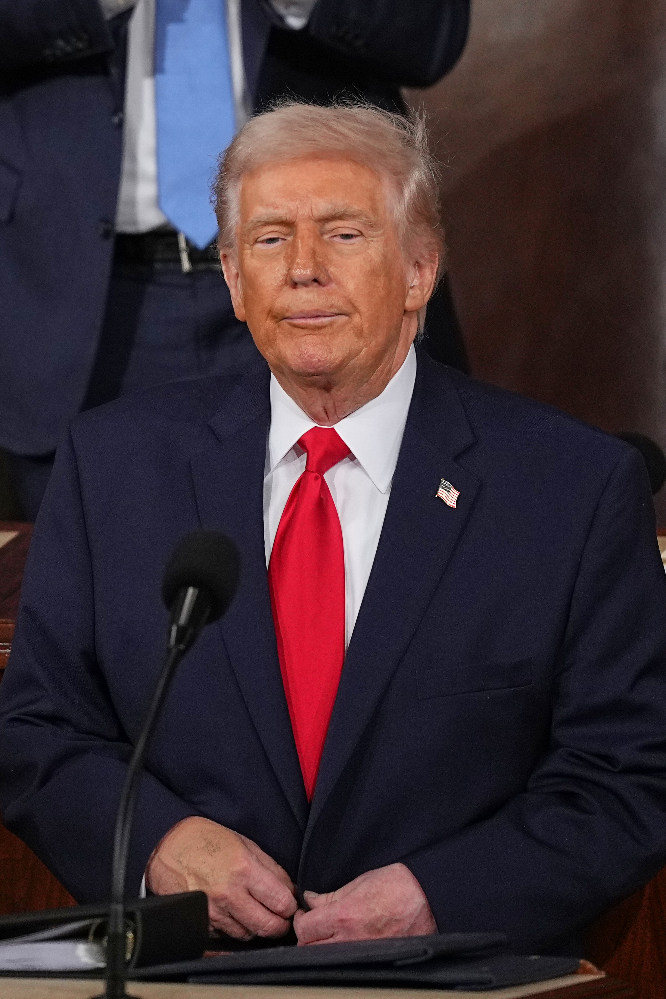President Donald Trump pauses after delivering the State of the Union address to a joint session of Congress in the House chamber at the U.S. Capitol in Washington, Tuesday, Feb. 24, 2026. (AP Photo/Matt Rourke)