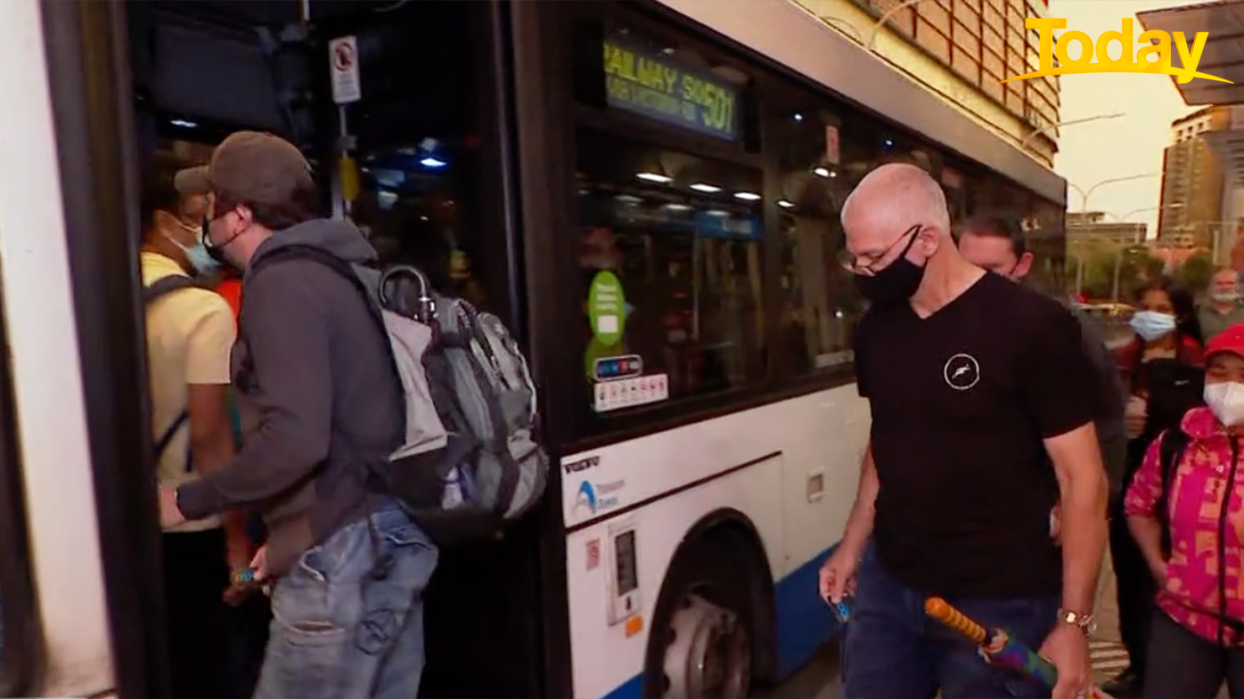 Commuters file on to buses amid the Sydney rail strike. 