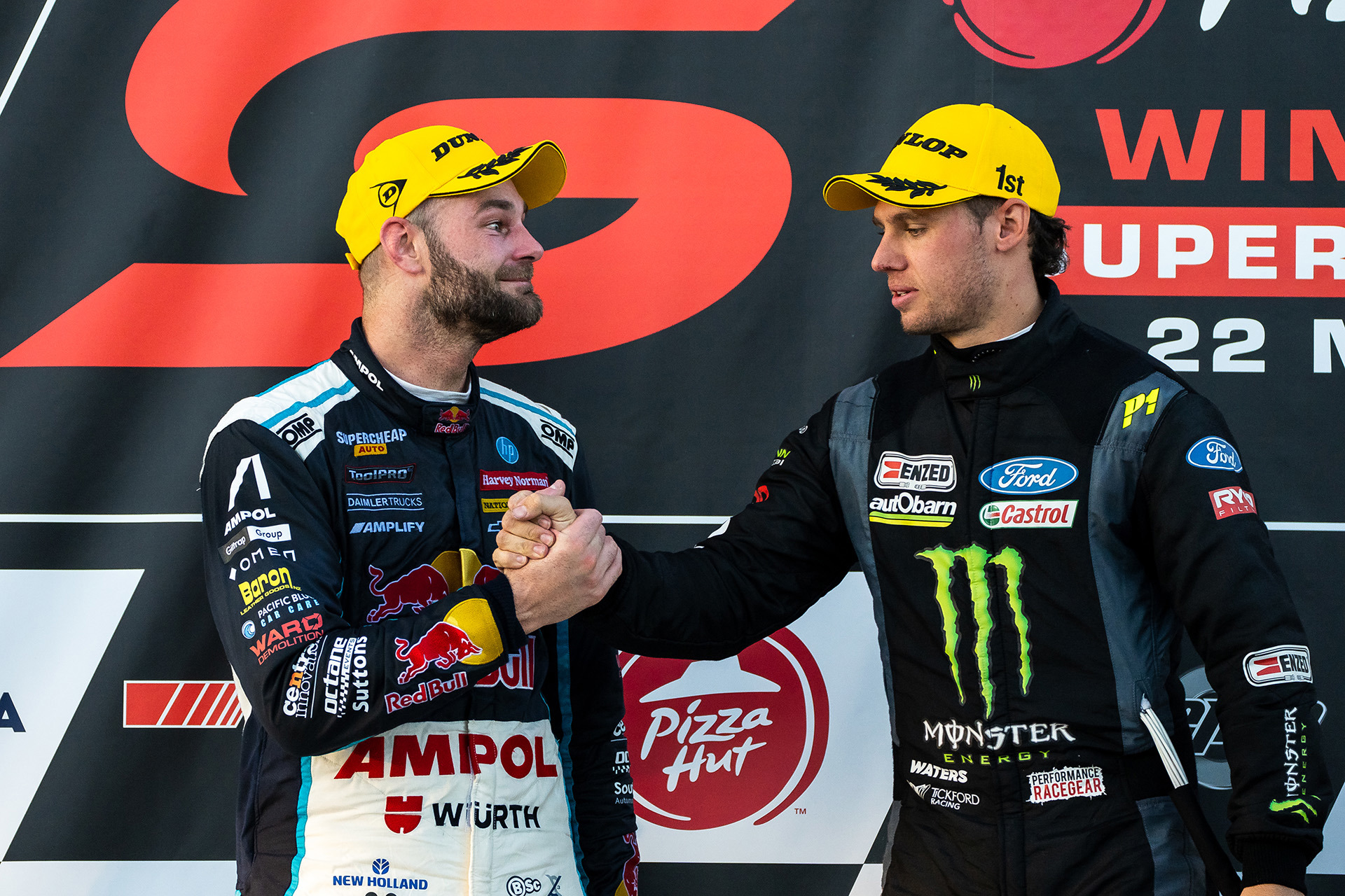 Shane van Gisbergen (left) and Cameron Waters on the podium at Winton Motor Raceway in 2022.