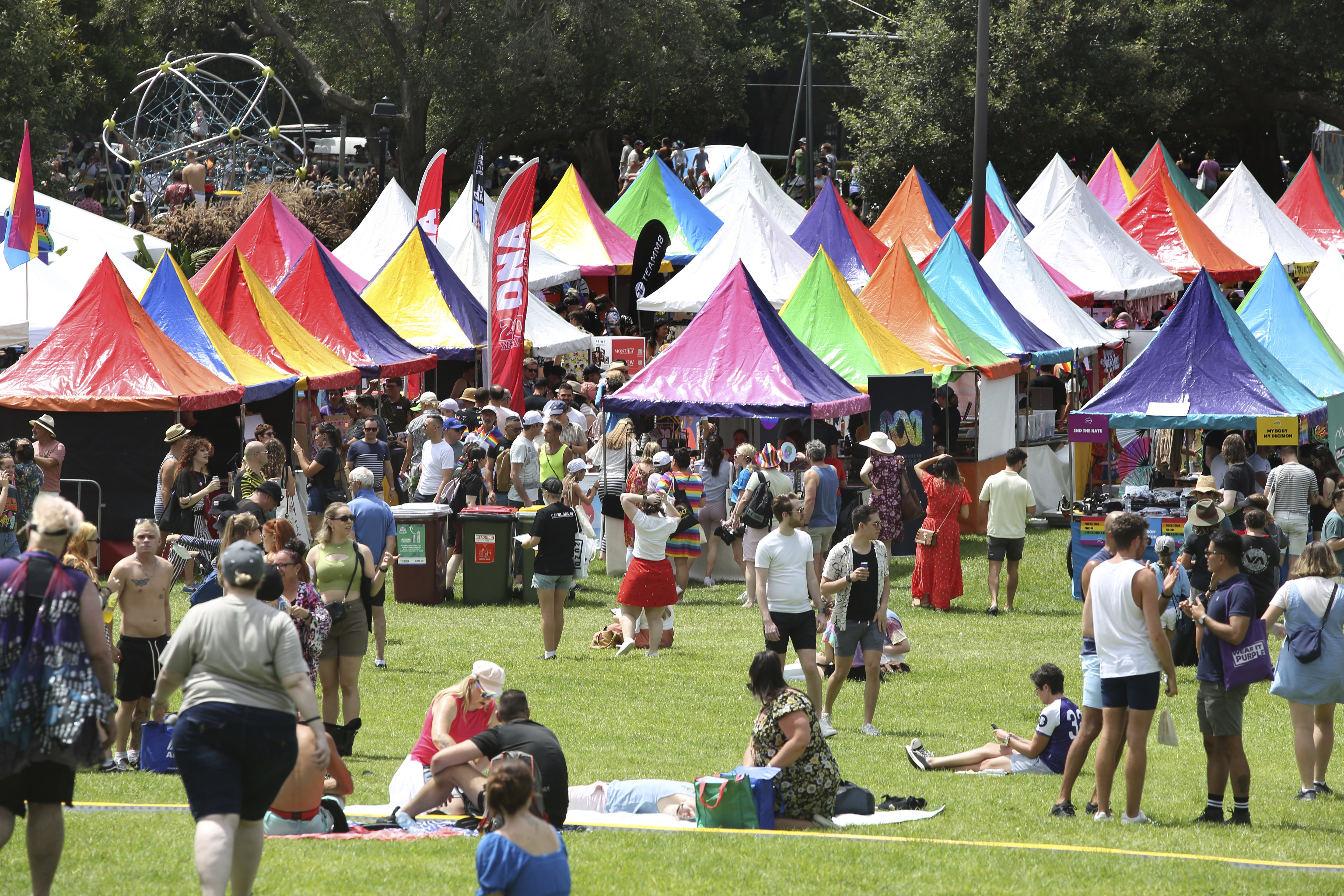 Colourful characters mark crowds at the Gay and Lesbian Mardi Gras Fair Day, Victoria Park.  Sydney. February 20, 2022. Photograph by James Alcock/SMH.