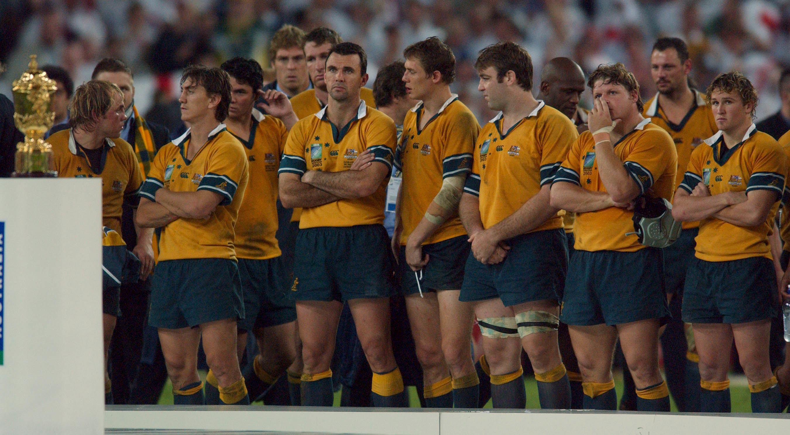 Dejected Wallabies look at what could have been during the trophy presentation.