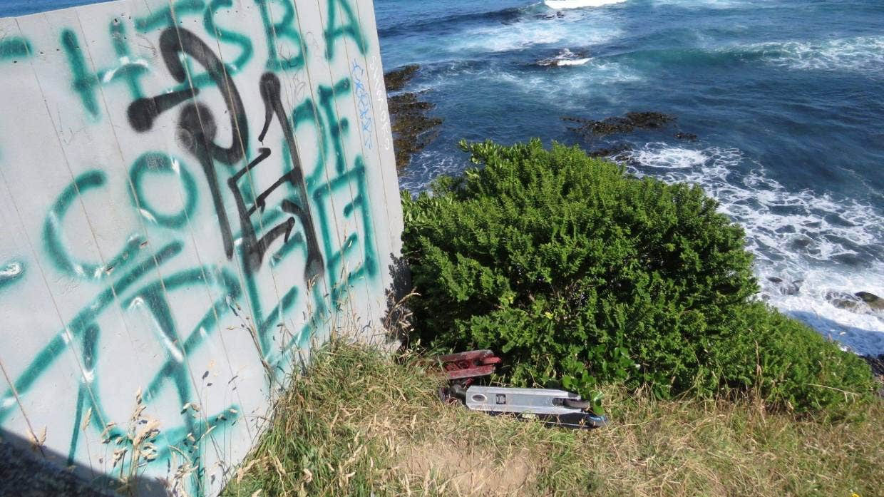 Scooters left near where Vincent and his friends jumped into the water.