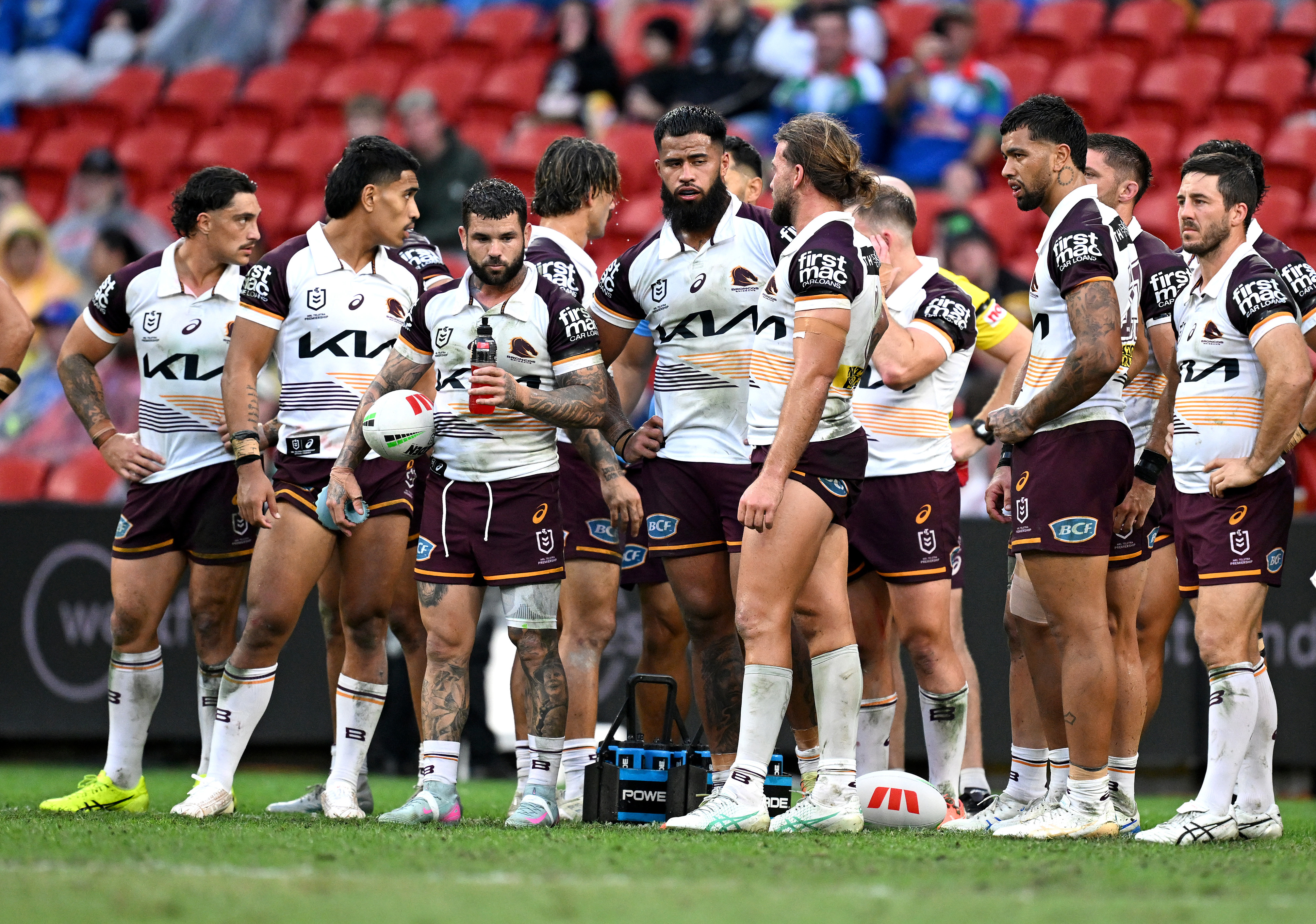 A dejected Broncos outfit during their round nine loss to the Panthers.