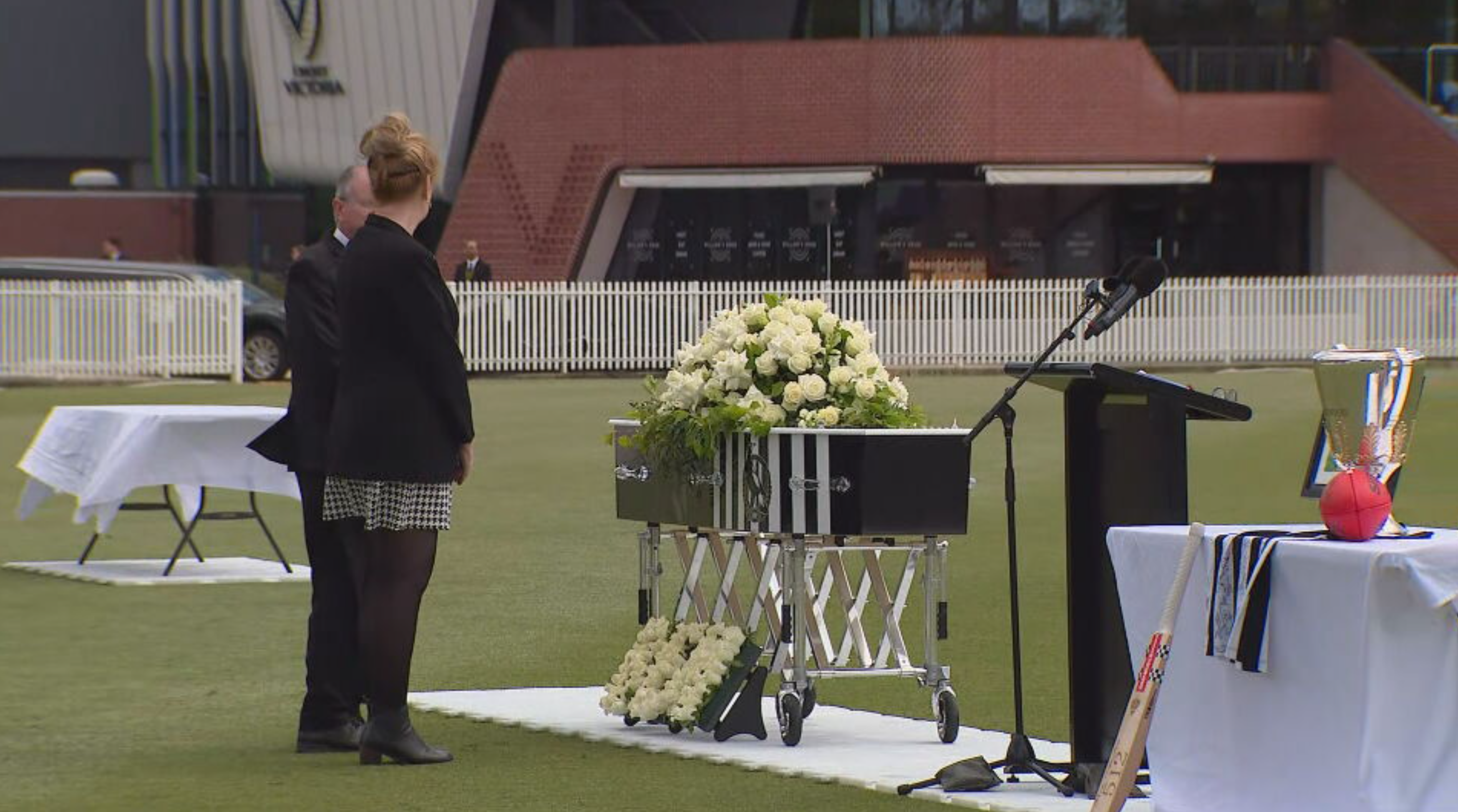 Ben's coffin, adorned with the logo of the Collingwood Football Club was displayed alongside a flower arrangement bearing his name.